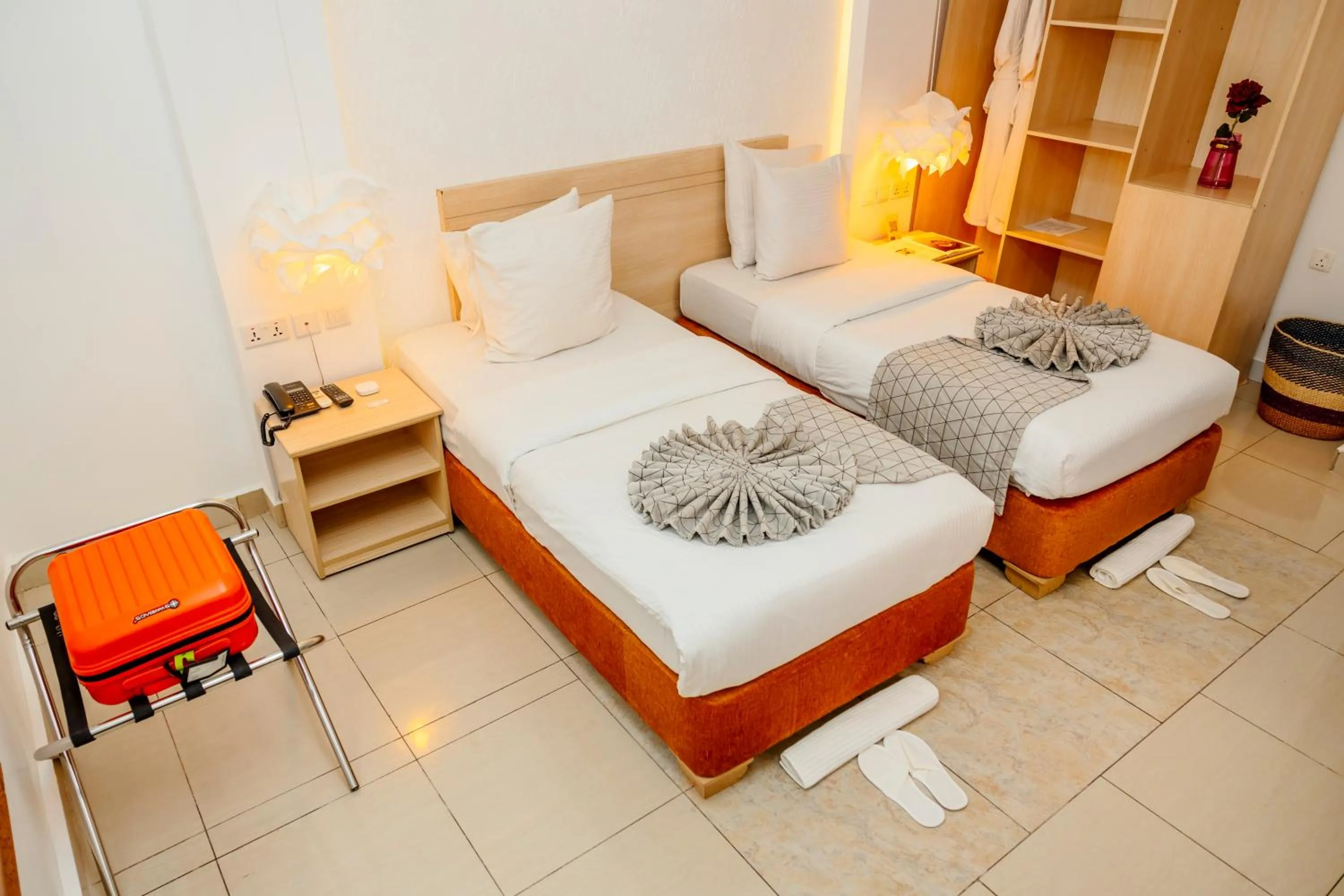Bed in Amata n'Ubuki Boutique Hotel Ltd