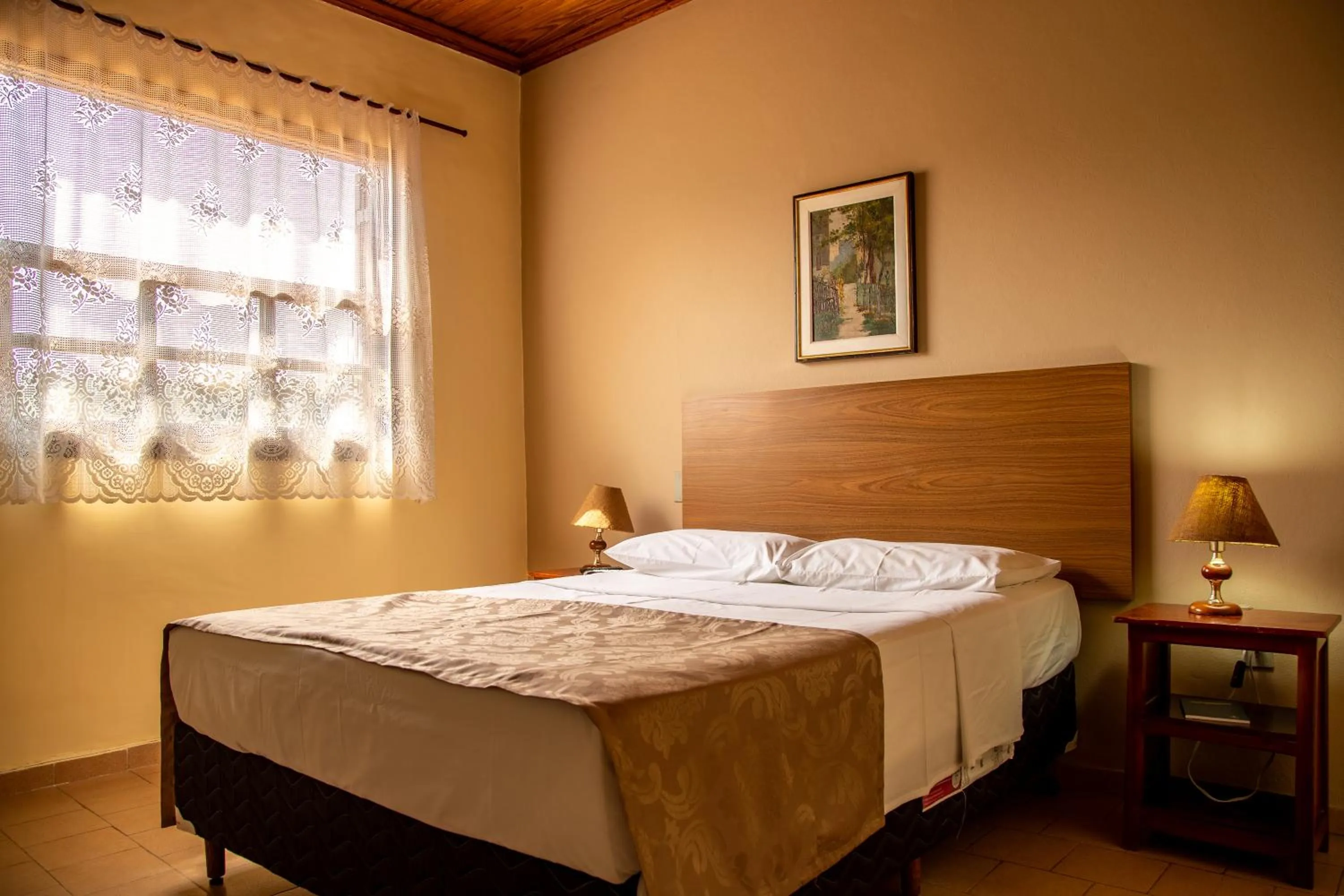 Bed in Pousada Lua Luana