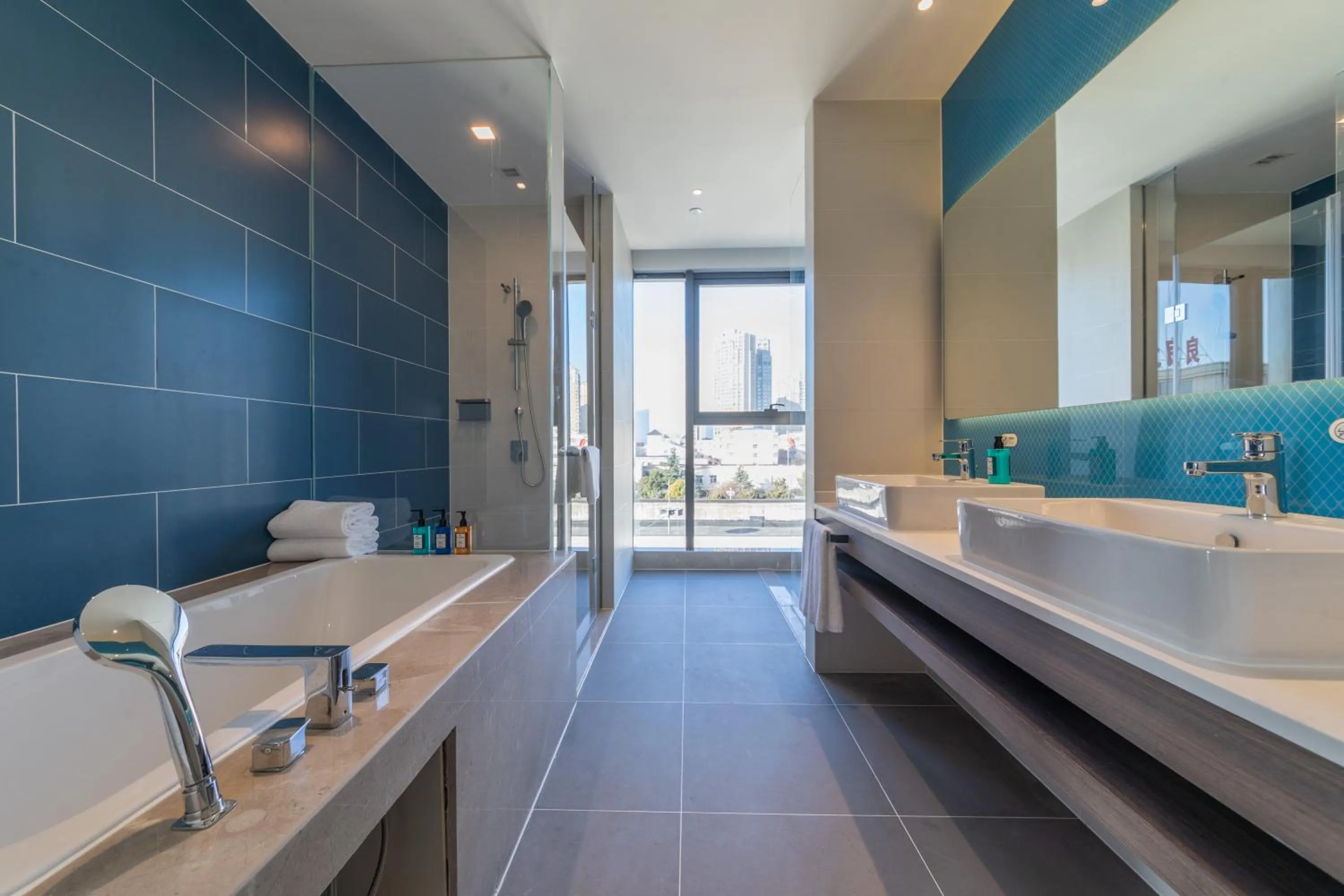 Bathroom in Holiday Inn Express Kaifeng City Center by IHG