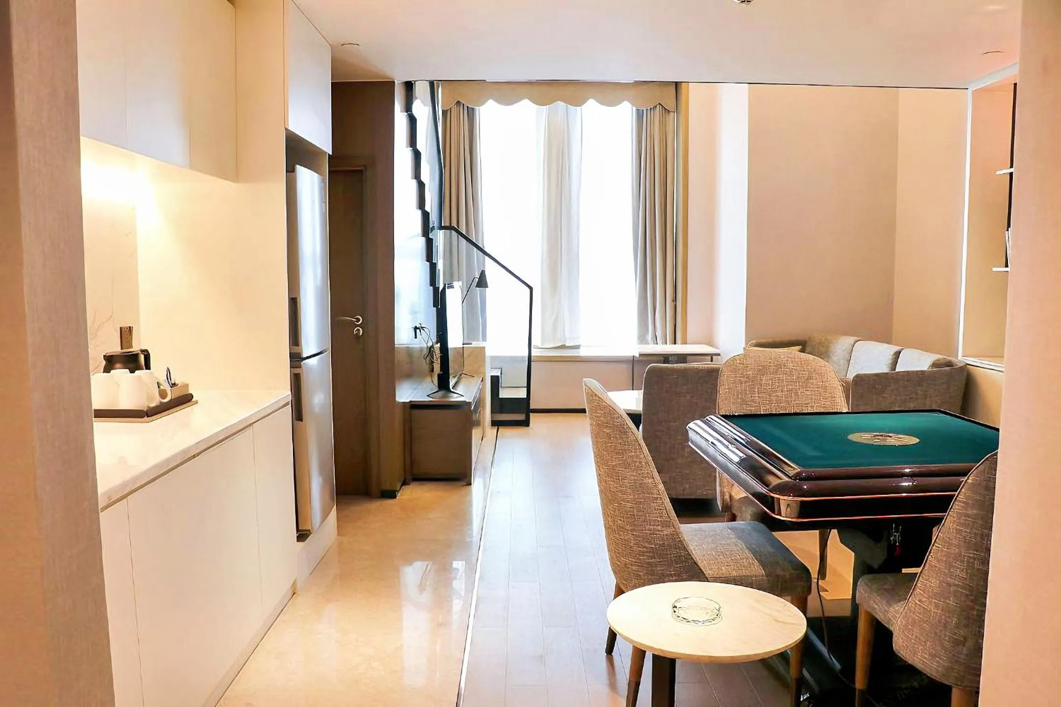 Living room in Crowne Plaza Wuhan Development Zone by IHG