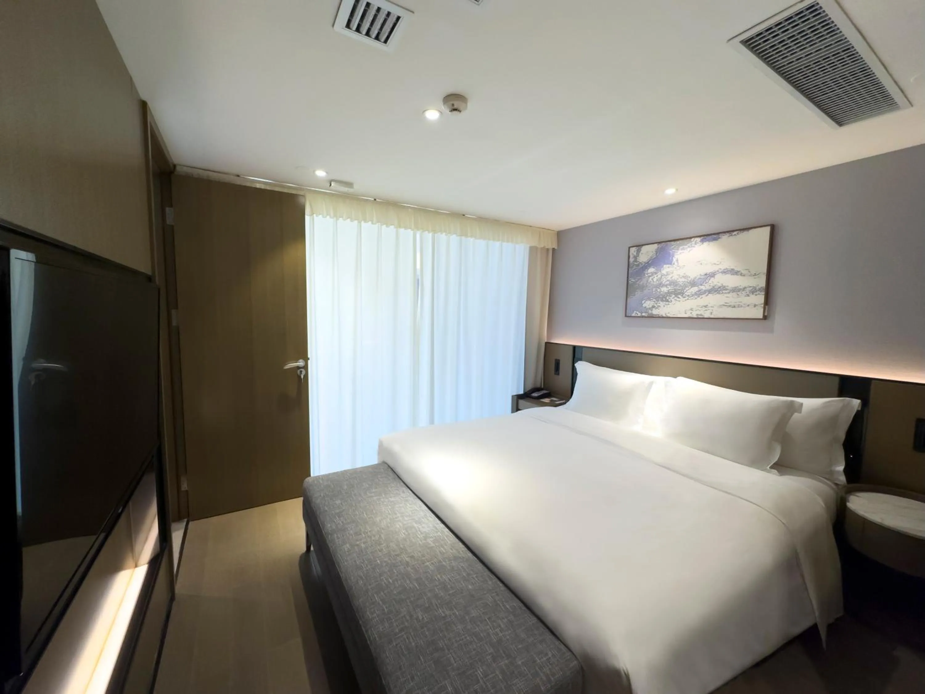 Bedroom, Bed in Crowne Plaza Wuhan Development Zone by IHG