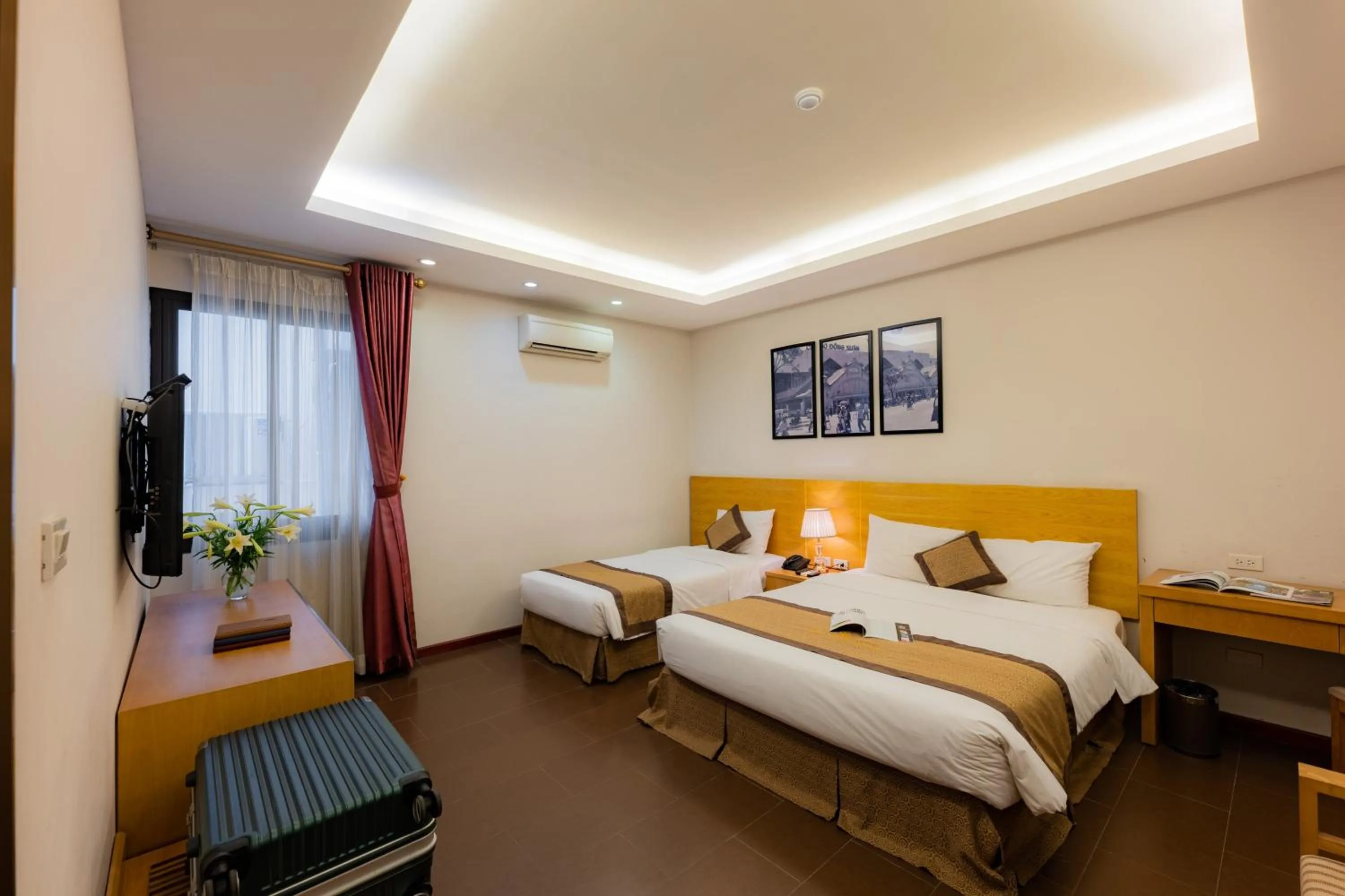 Bed in Riverside Hanoi Hotel