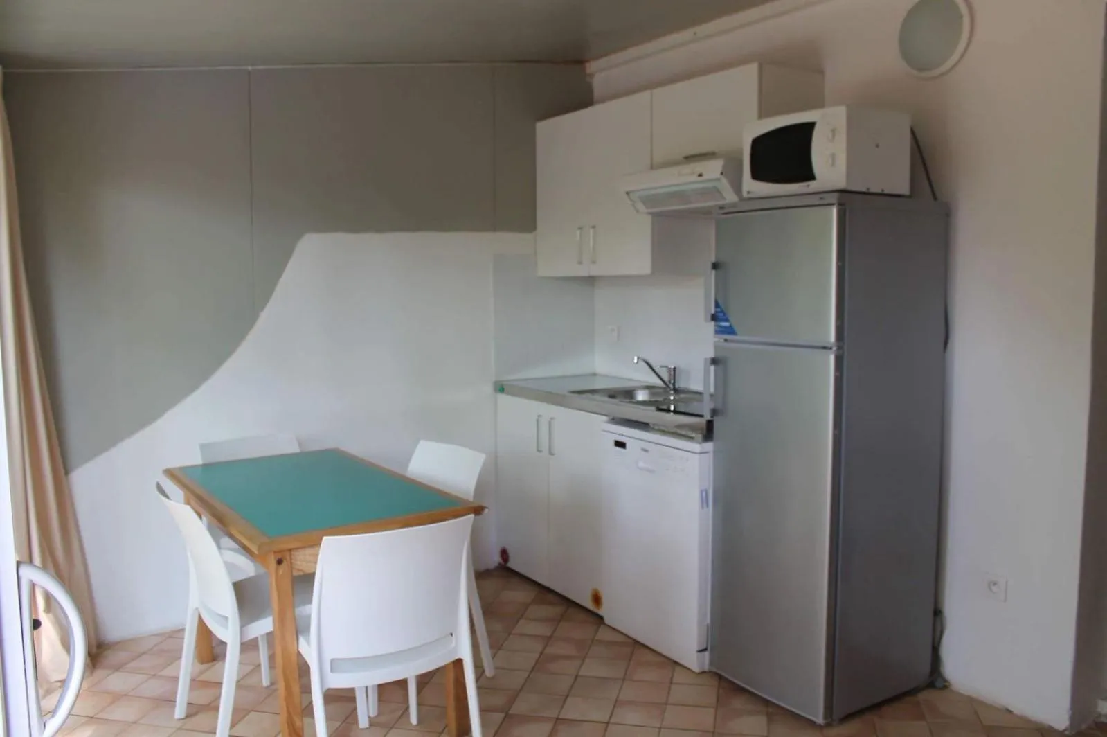 Kitchen or kitchenette in Résidence Cala Bianca