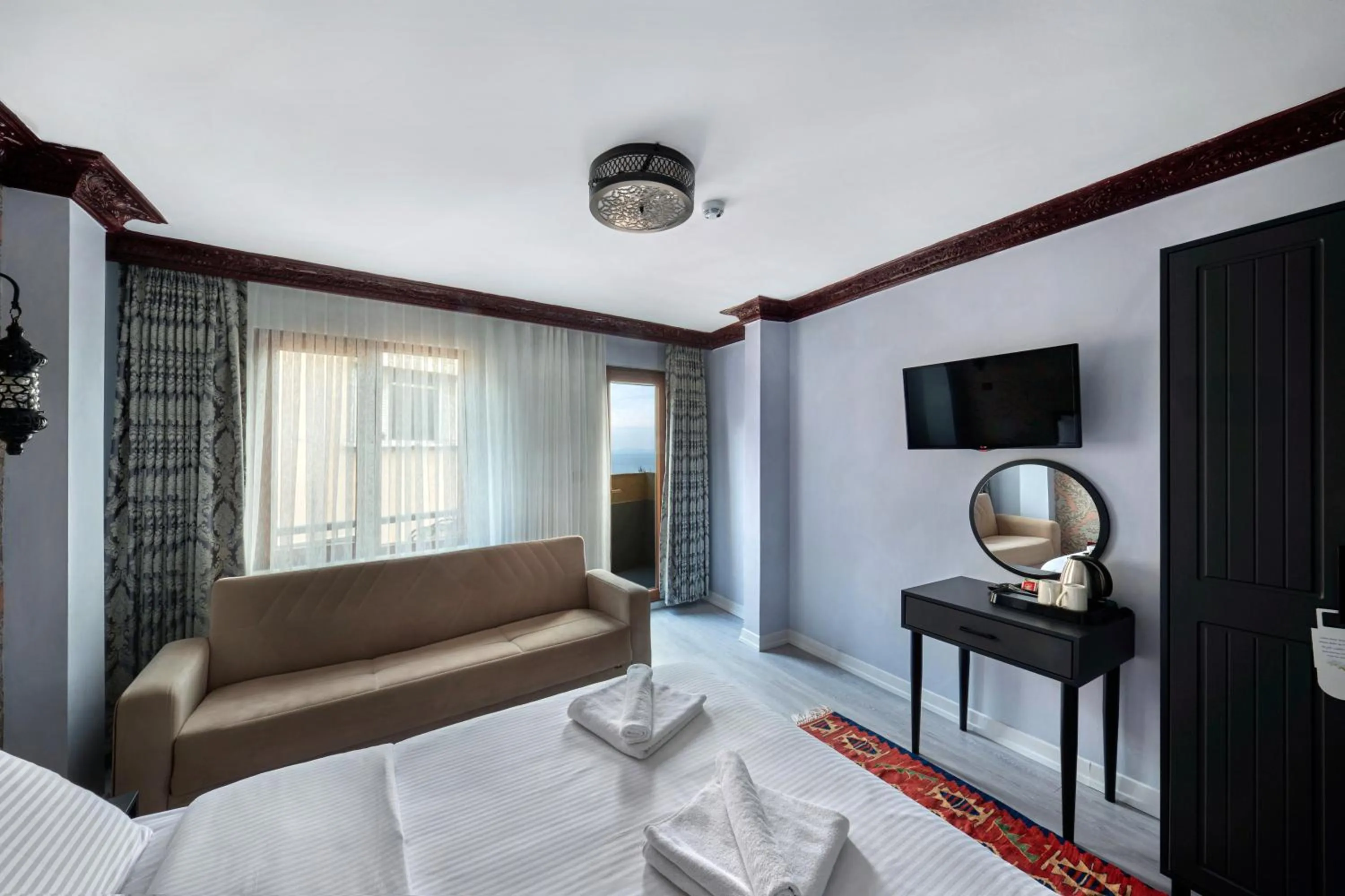 TV and multimedia, Bed in Mytra Hotel