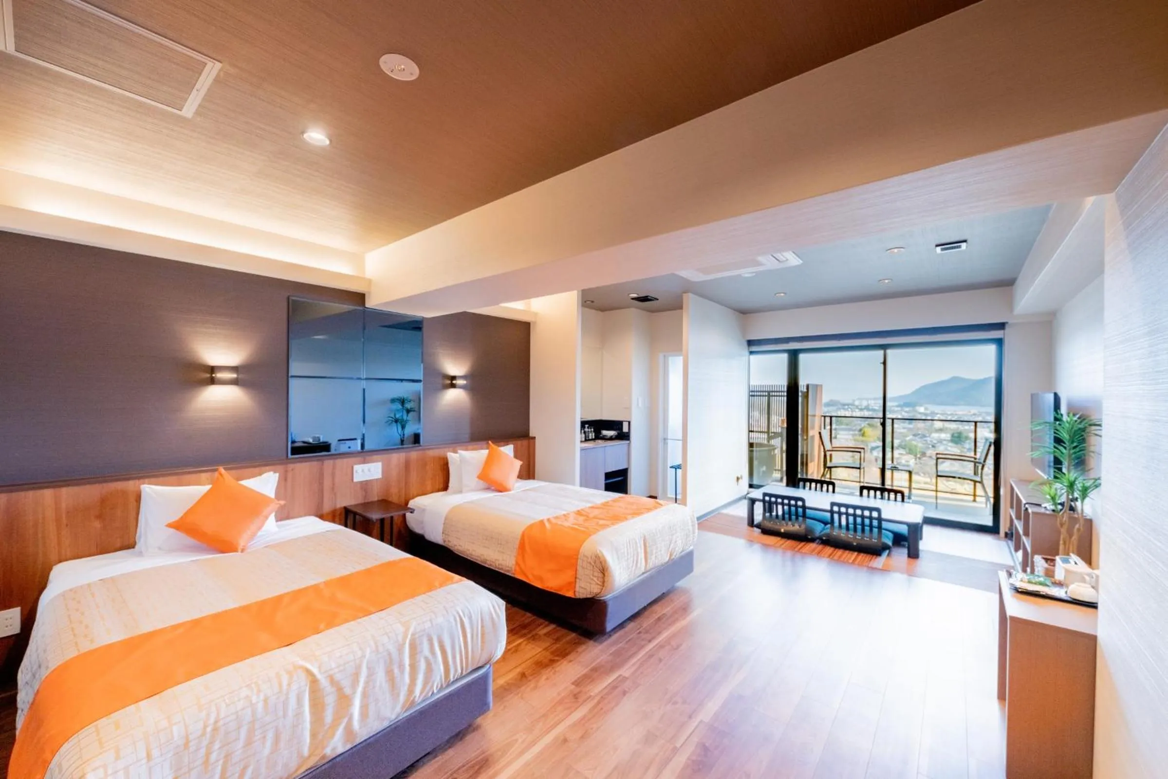 Bed in LiVEMAX RESORT Miyahama Ocean View