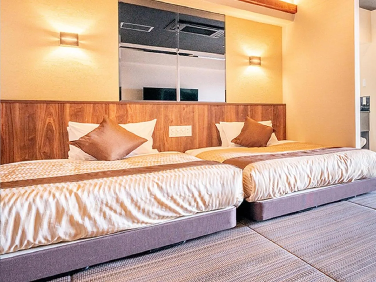 Bed in LiVEMAX RESORT Miyahama Ocean View