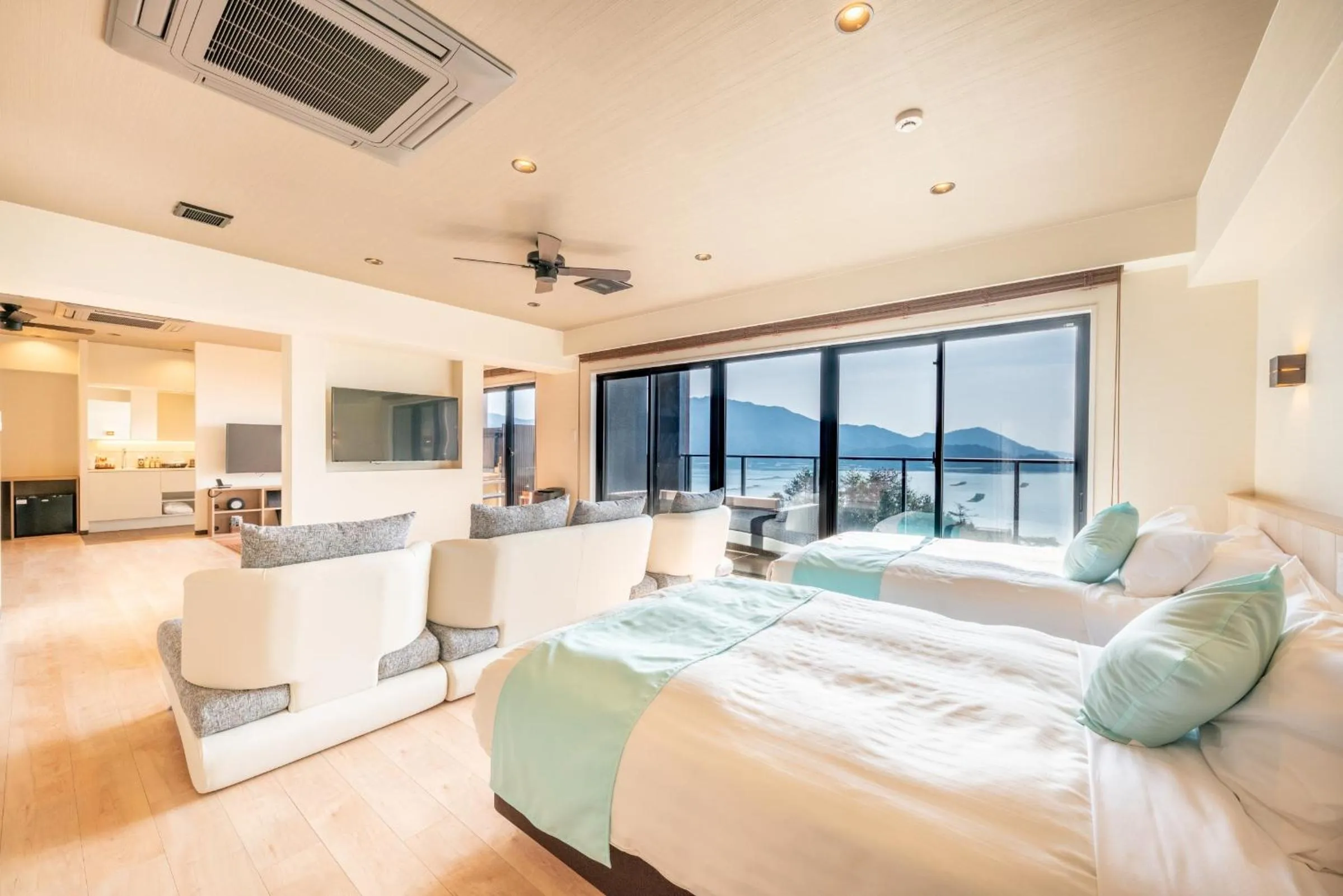 Bed in LiVEMAX RESORT Miyahama Ocean View