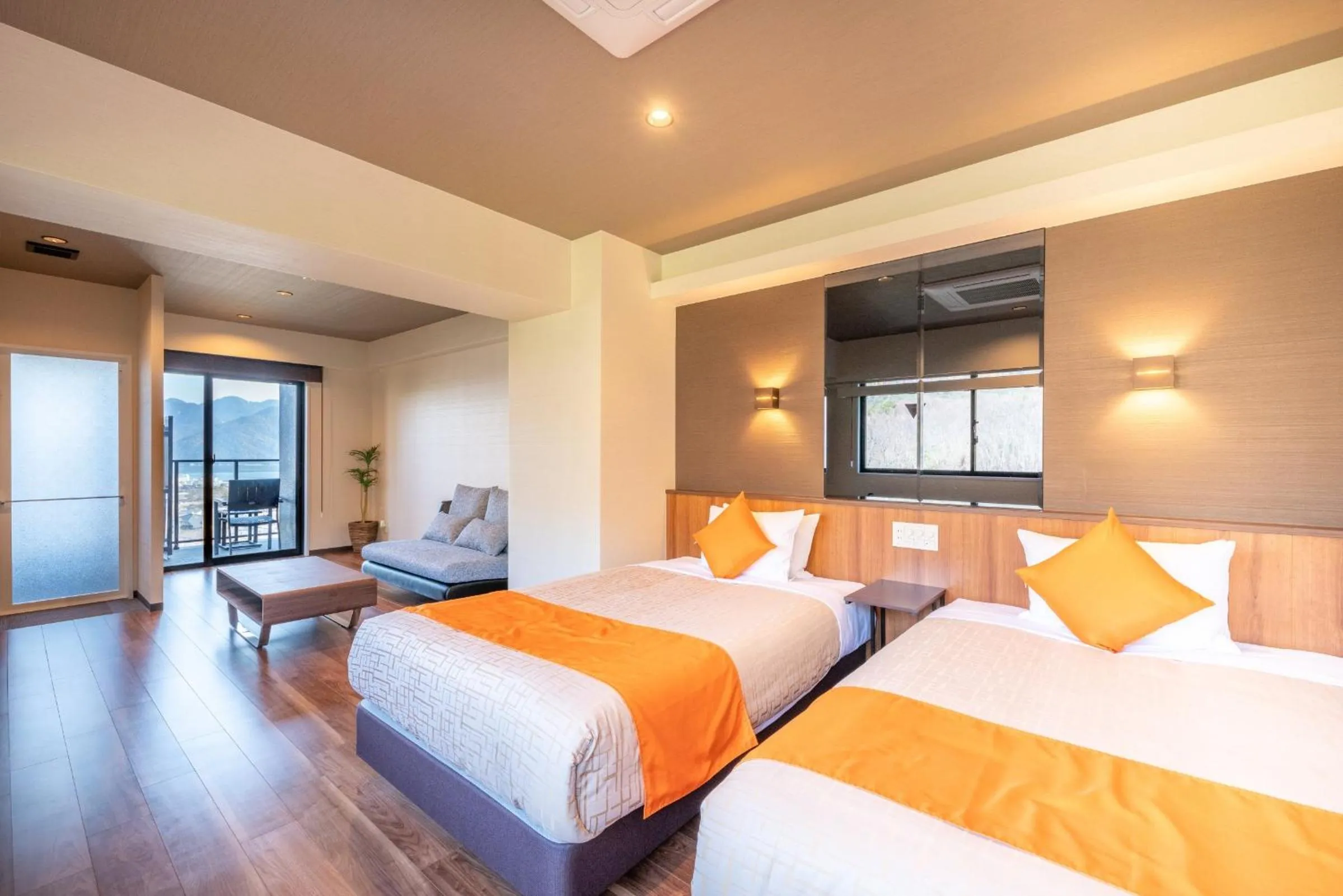 Bed in LiVEMAX RESORT Miyahama Ocean View