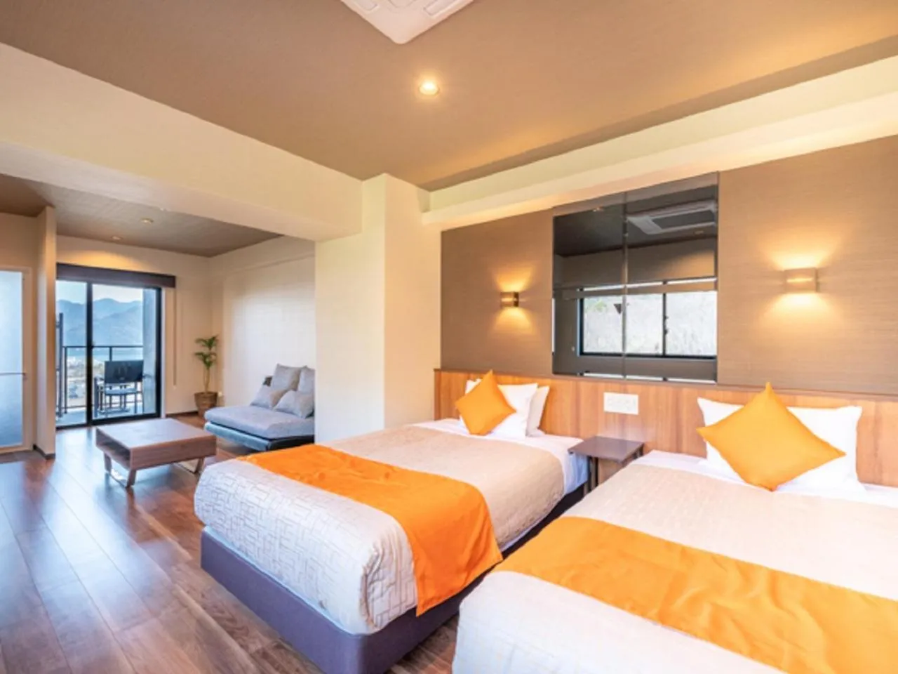 Bed in LiVEMAX RESORT Miyahama Ocean View