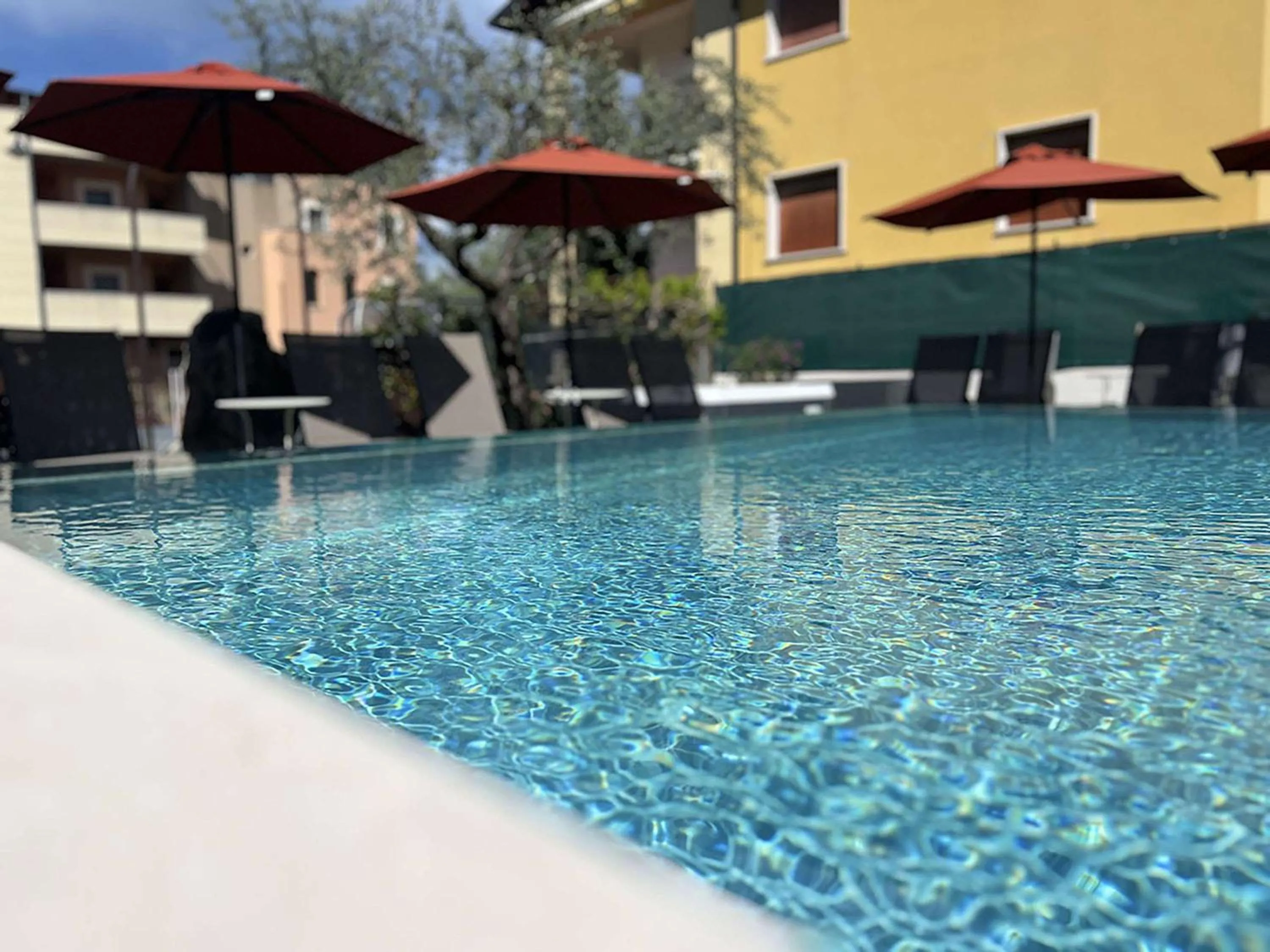 Pool view in Hotel Ristorante Al Caminetto WorldHotels Crafted Adults Only