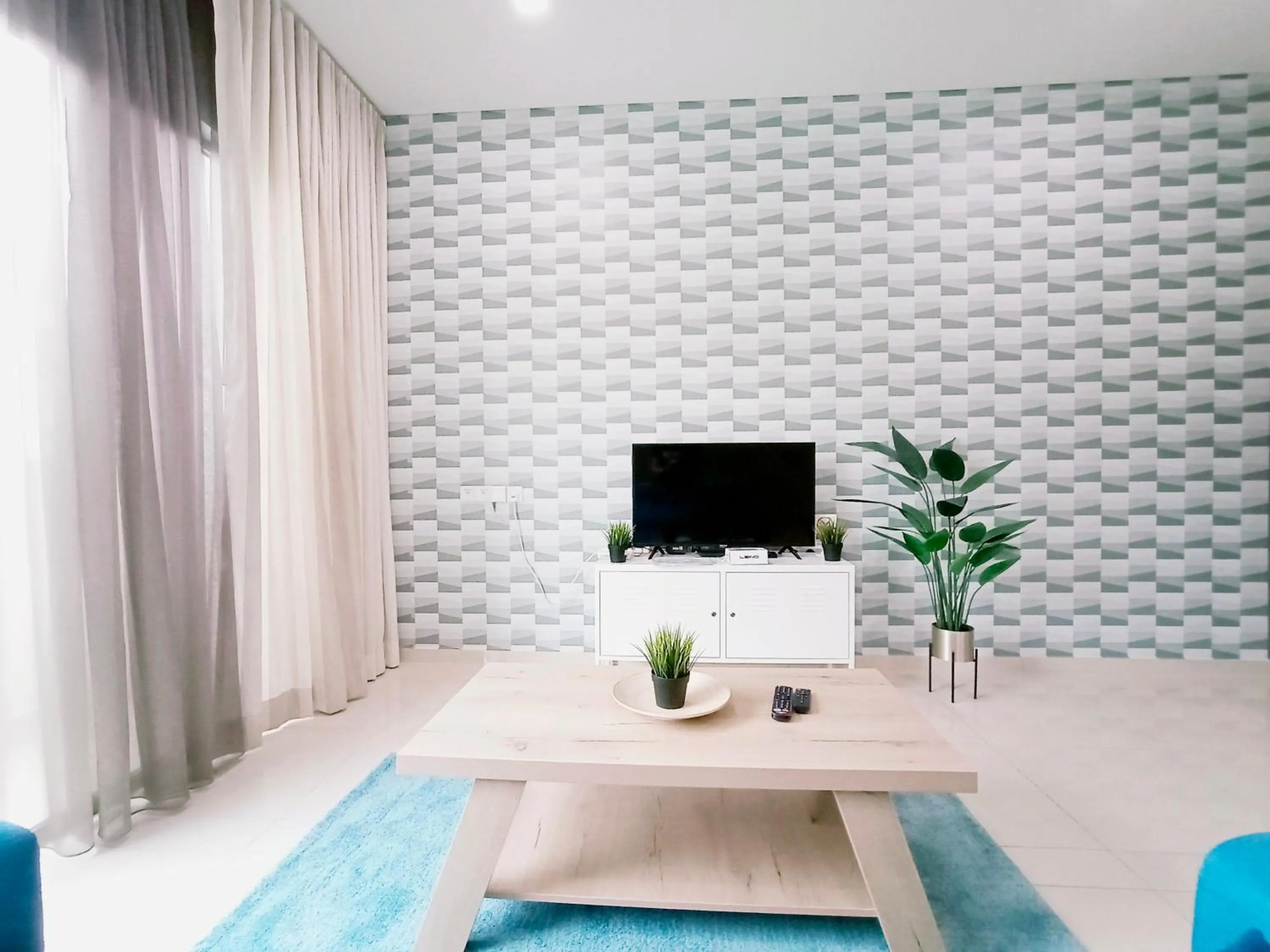 Communal lounge/ TV room in Plaza Arkadia Desa Parkcity by KLhomesweet