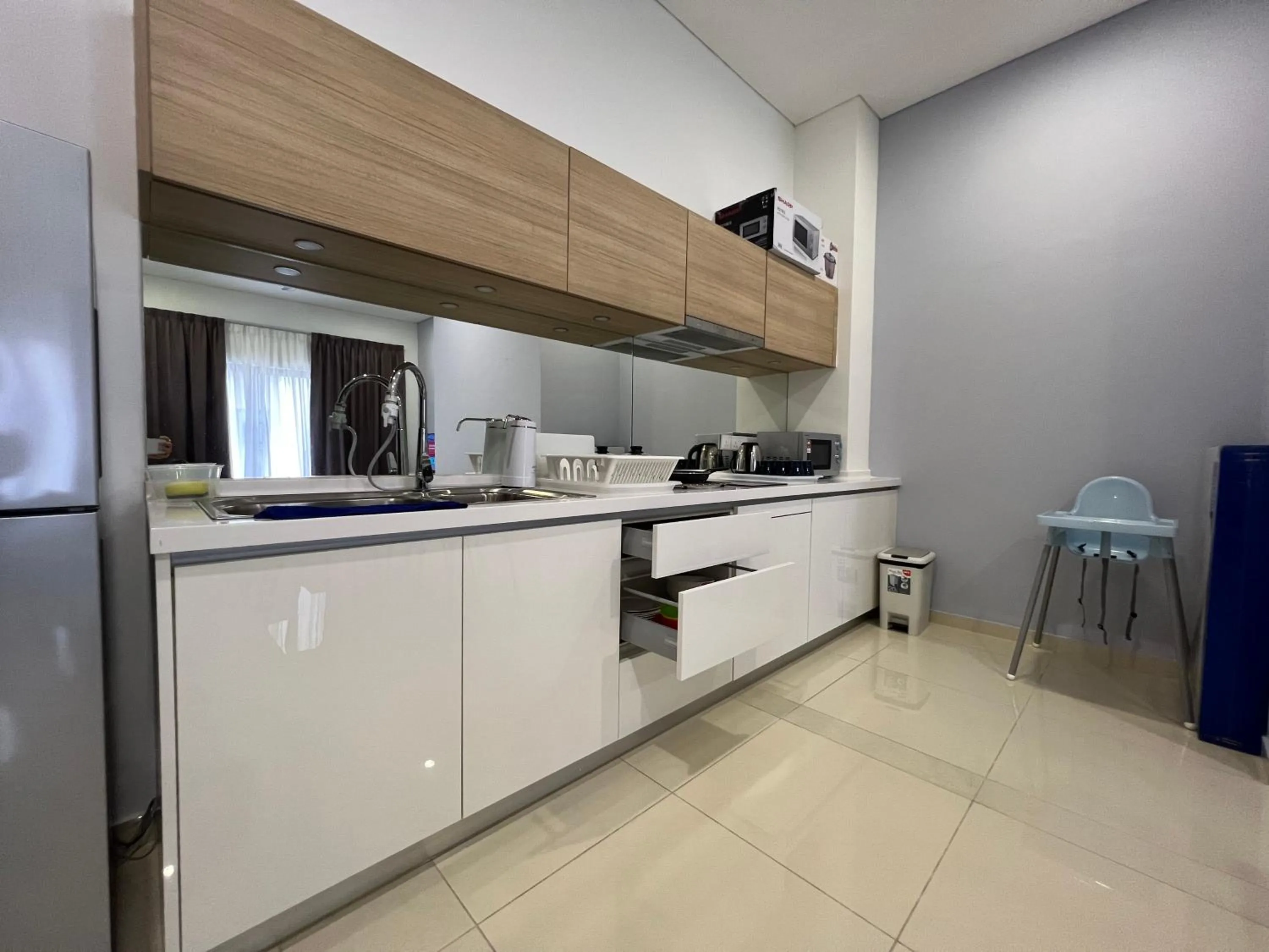 Kitchen or kitchenette in Plaza Arkadia Desa Parkcity by KLhomesweet