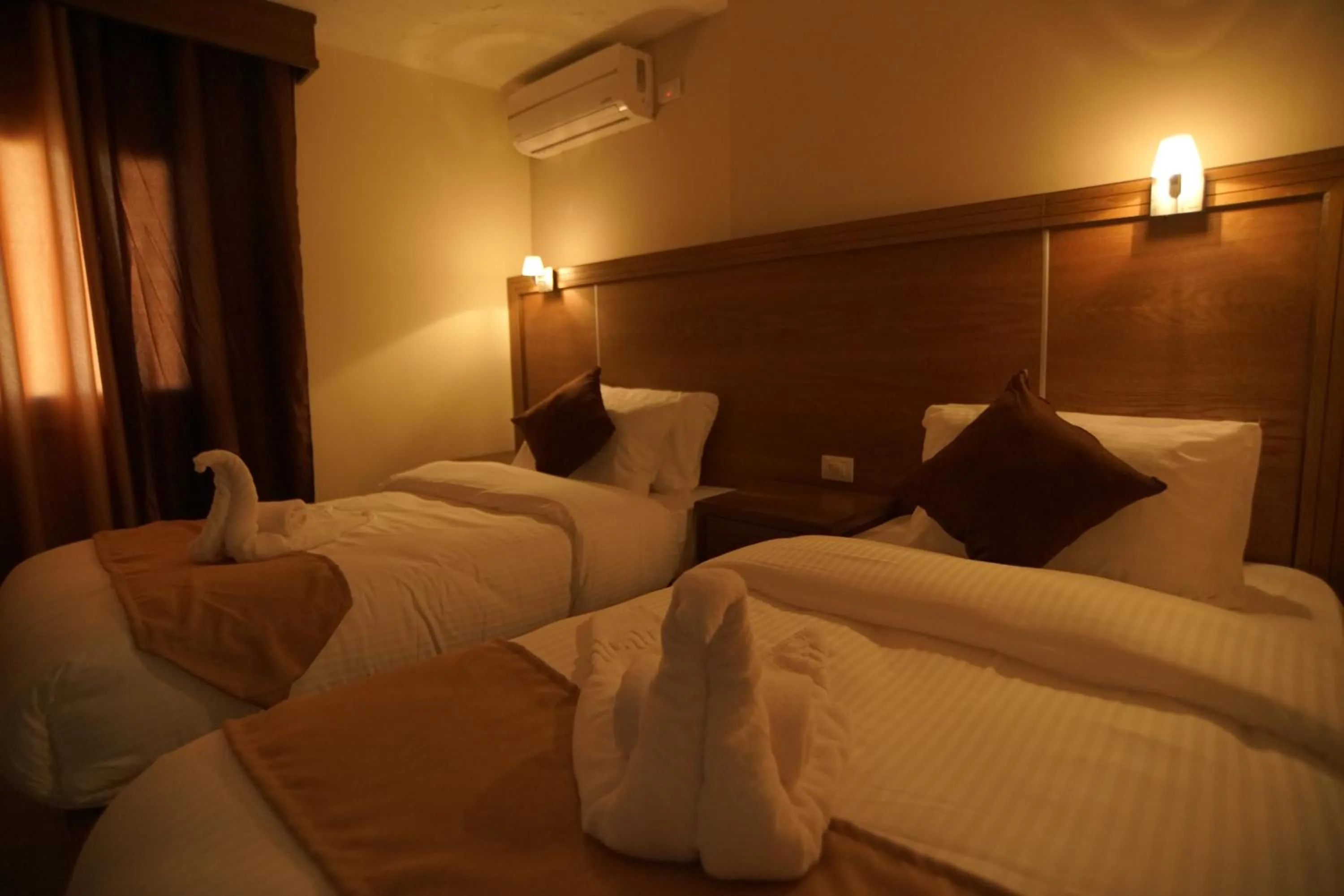 Photo of the whole room, Bed in Petra Aretas Hotel