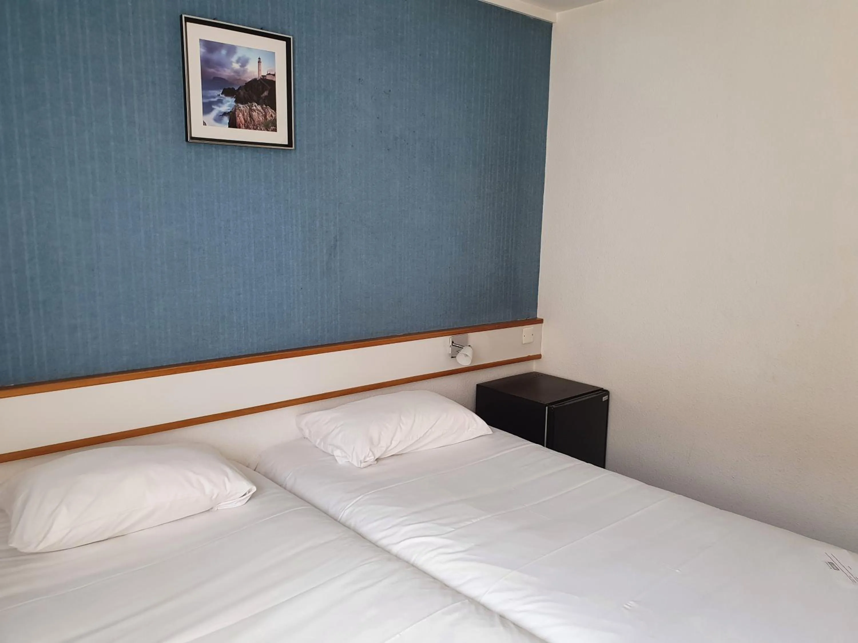 Bed in HOTEL Chateau-Thierry Centre