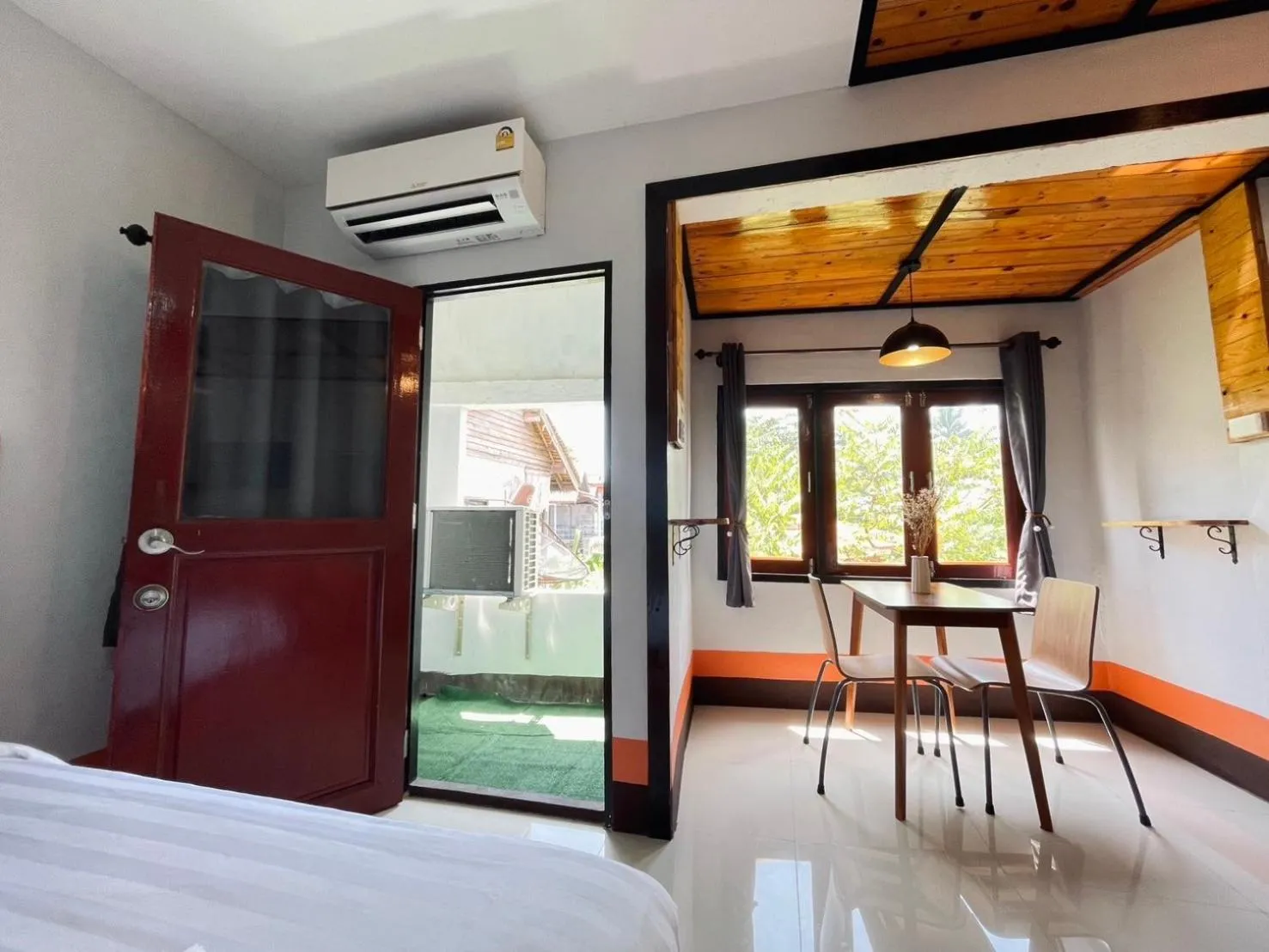 air conditioner, Bed in Mookboonchu Guesthouse ,Kohmook Trang