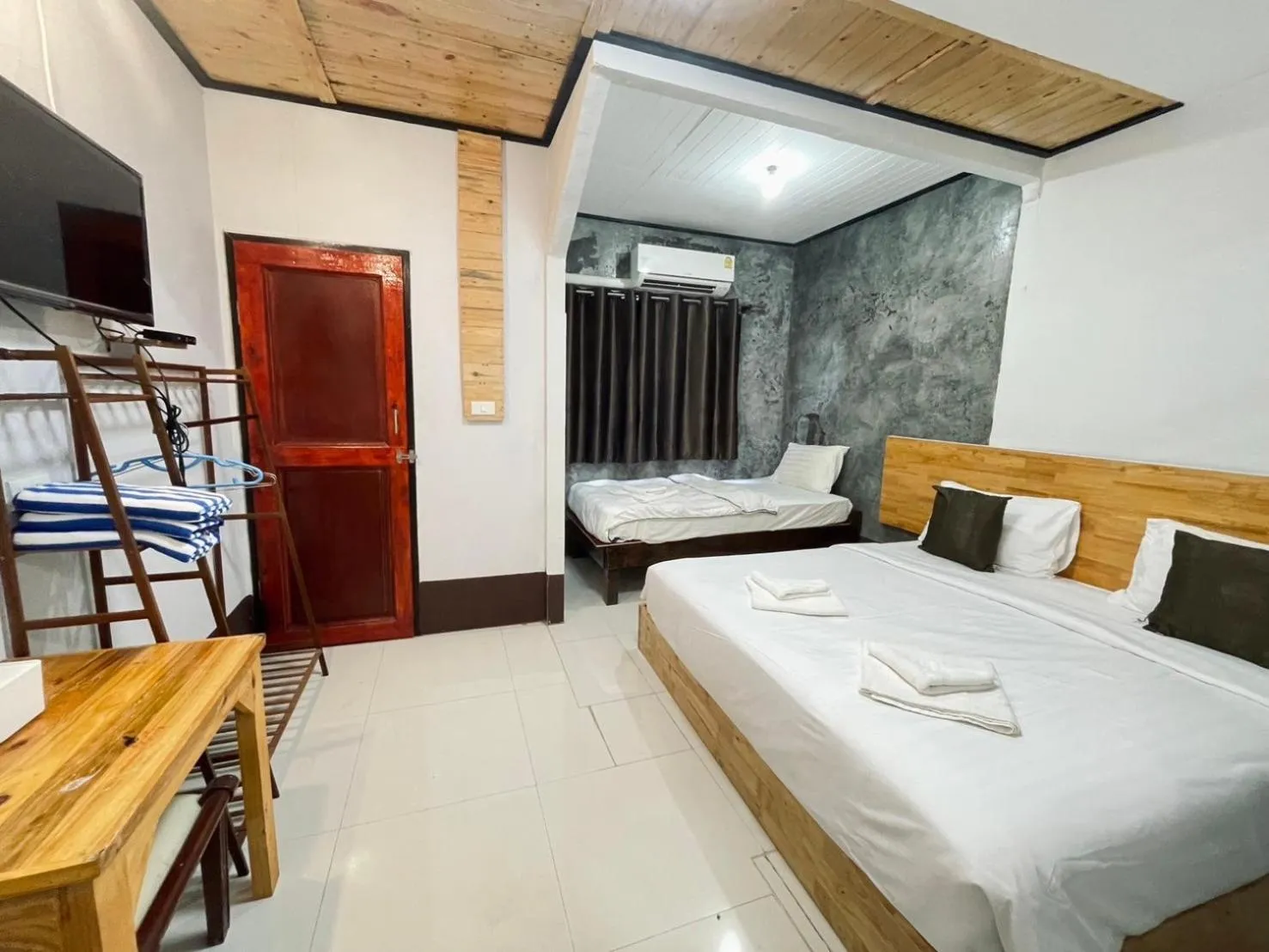 Living room, Bed in Mookboonchu Guesthouse ,Kohmook Trang