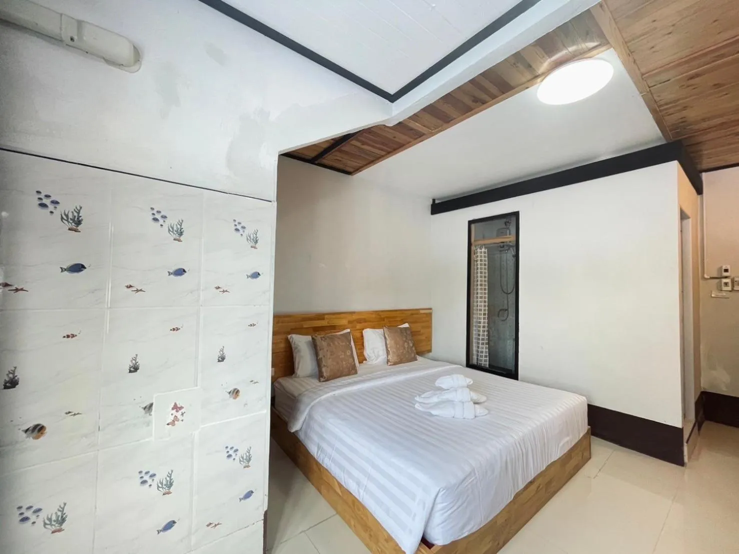 Bed in Mookboonchu Guesthouse ,Kohmook Trang