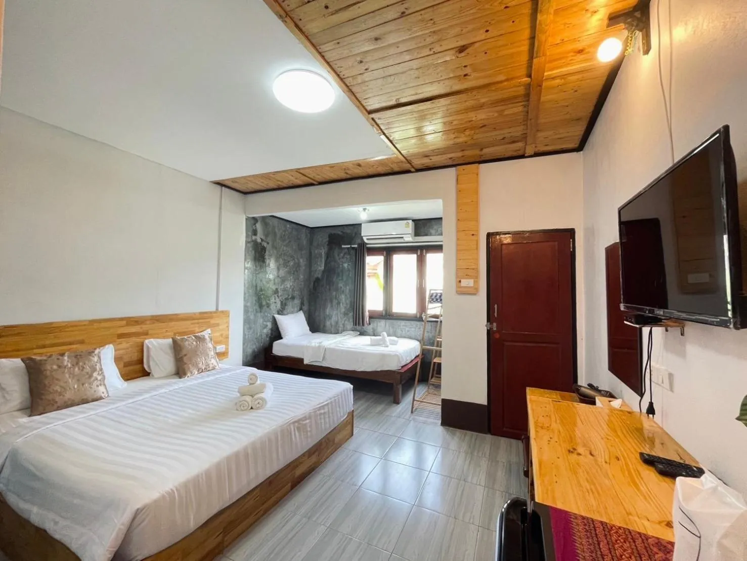 Photo of the whole room, Bed in Mookboonchu Guesthouse ,Kohmook Trang