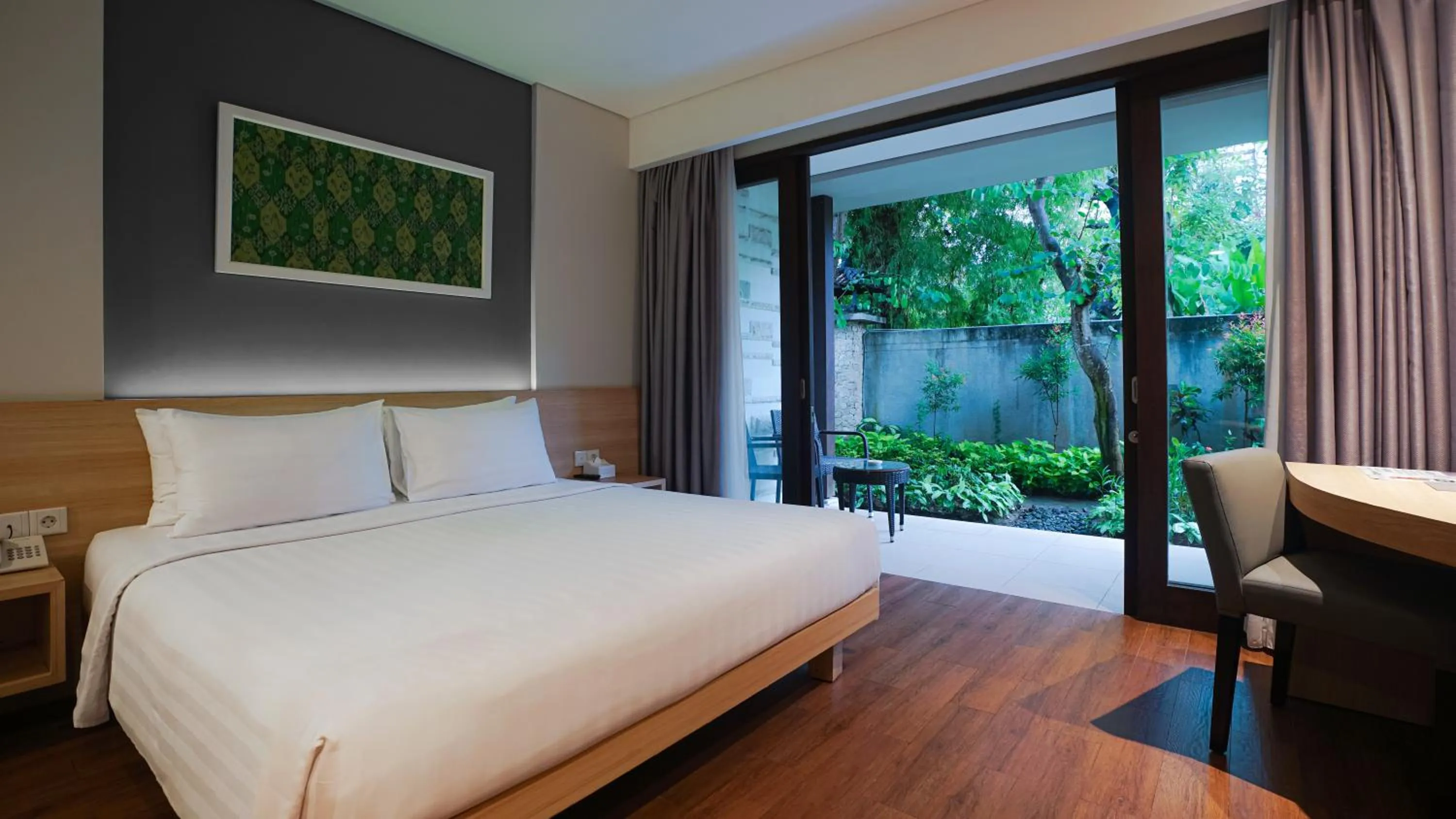 Bed in Grand Whiz Hotel Nusa Dua Bali