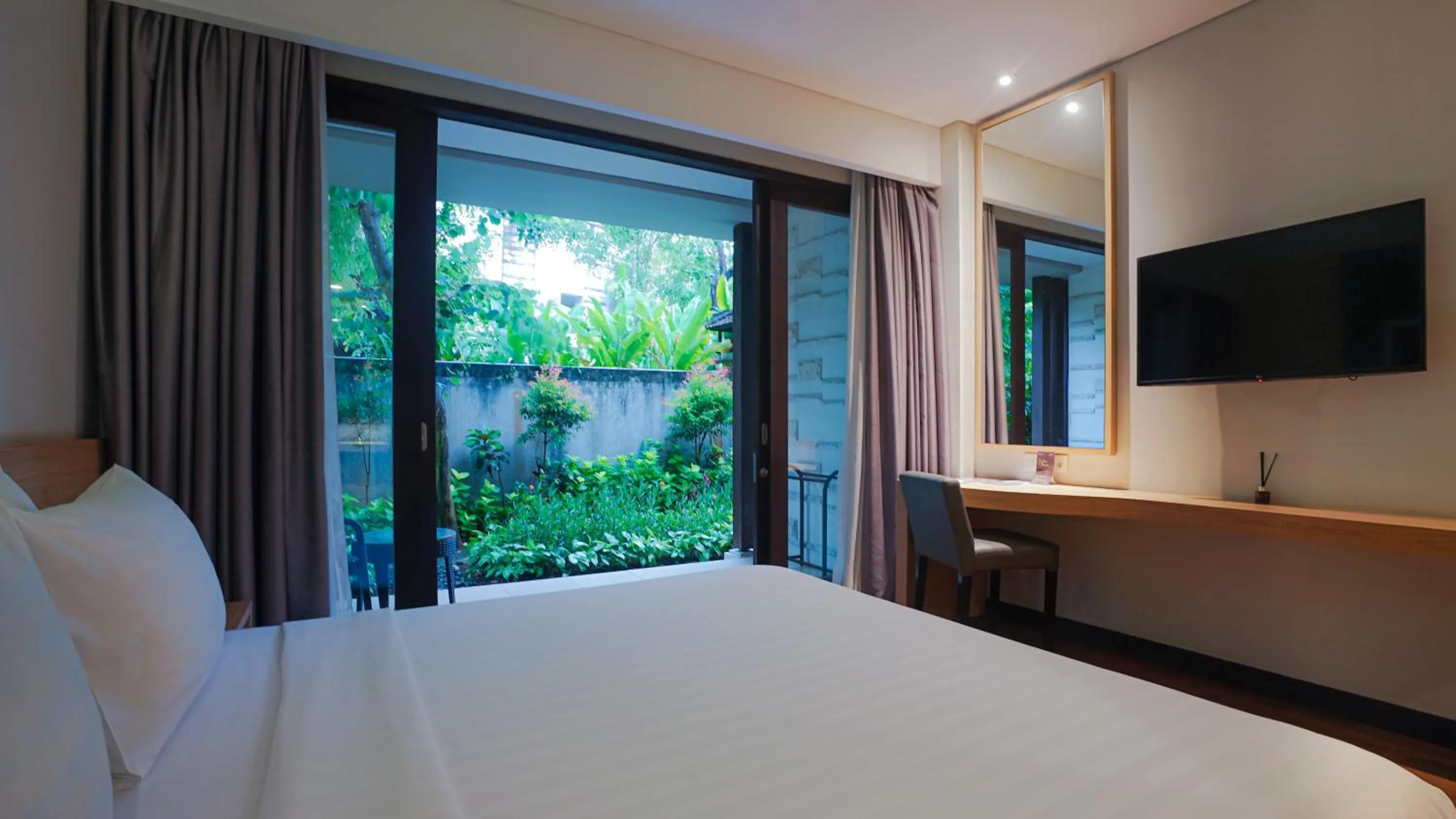Bed in Grand Whiz Hotel Nusa Dua Bali