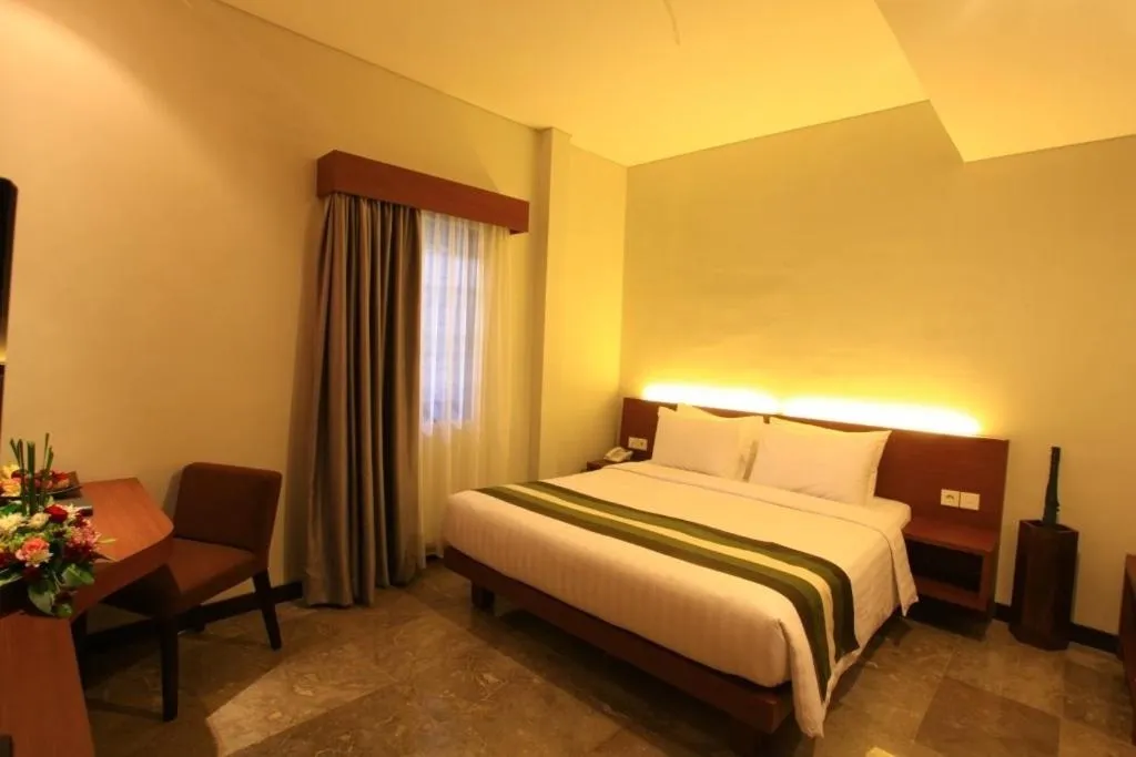 Bed in Grand Whiz Hotel Nusa Dua Bali