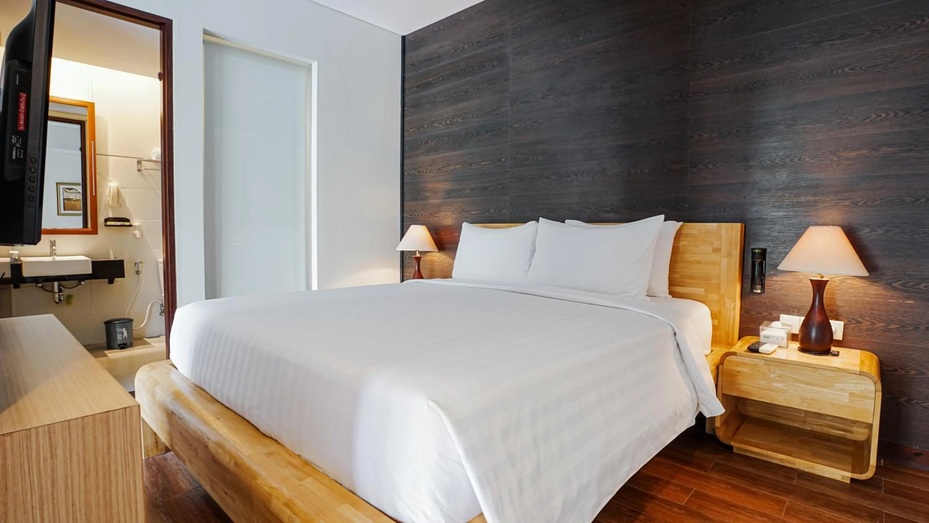 Bed in Grand Whiz Hotel Nusa Dua Bali