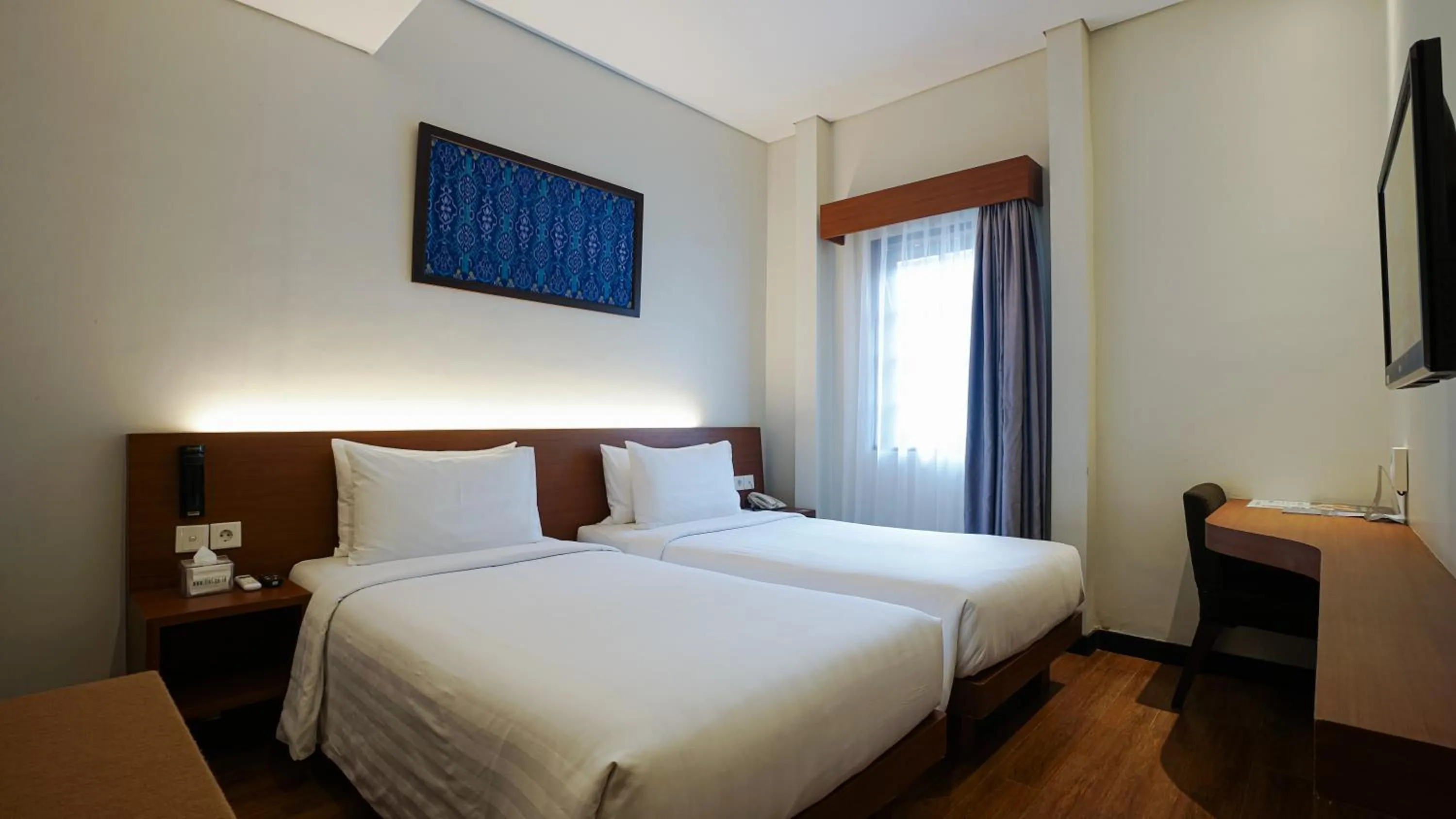 Bed in Grand Whiz Hotel Nusa Dua Bali