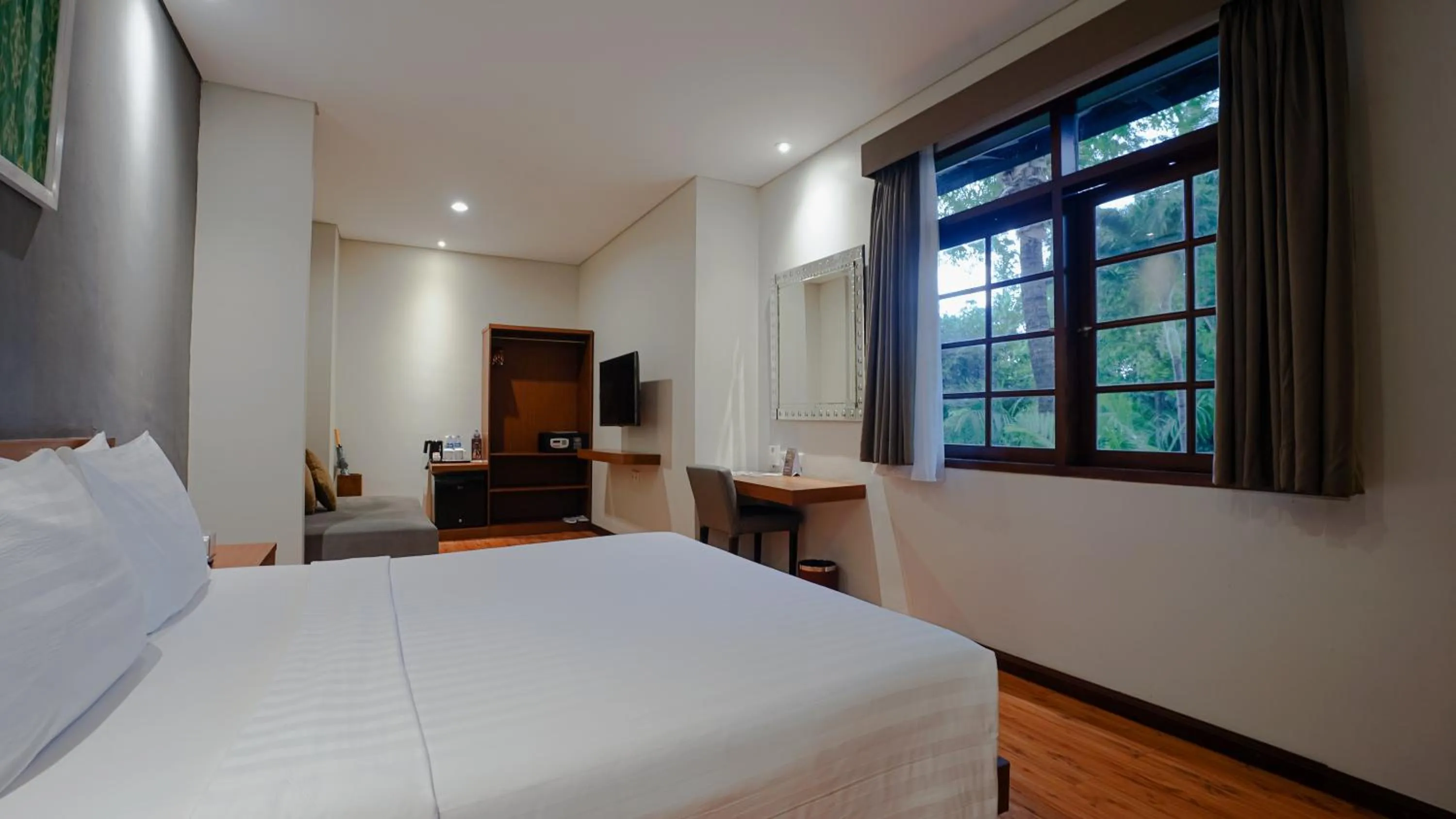 Bed in Grand Whiz Hotel Nusa Dua Bali
