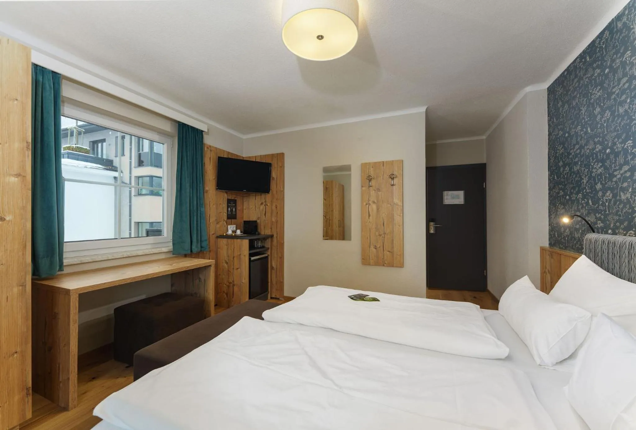 Bed in Landhaus Hubertus Wellness & Breakfast