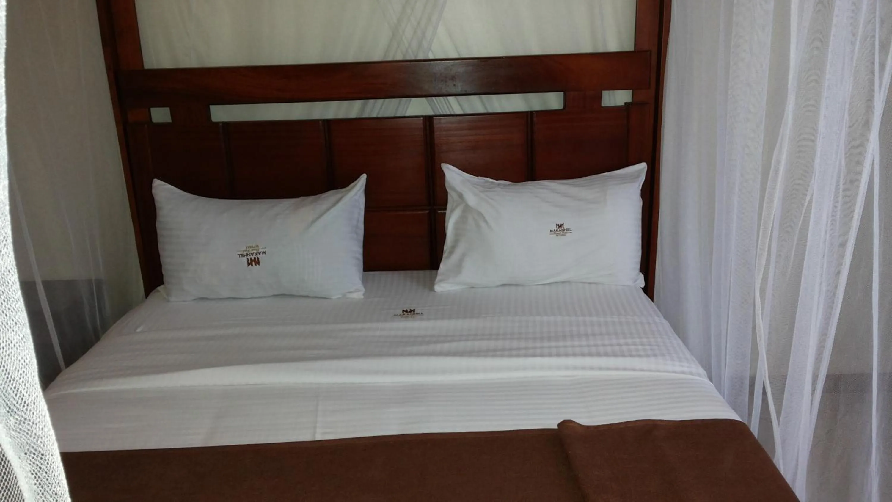 Bed in MakanHill Resort Hotel
