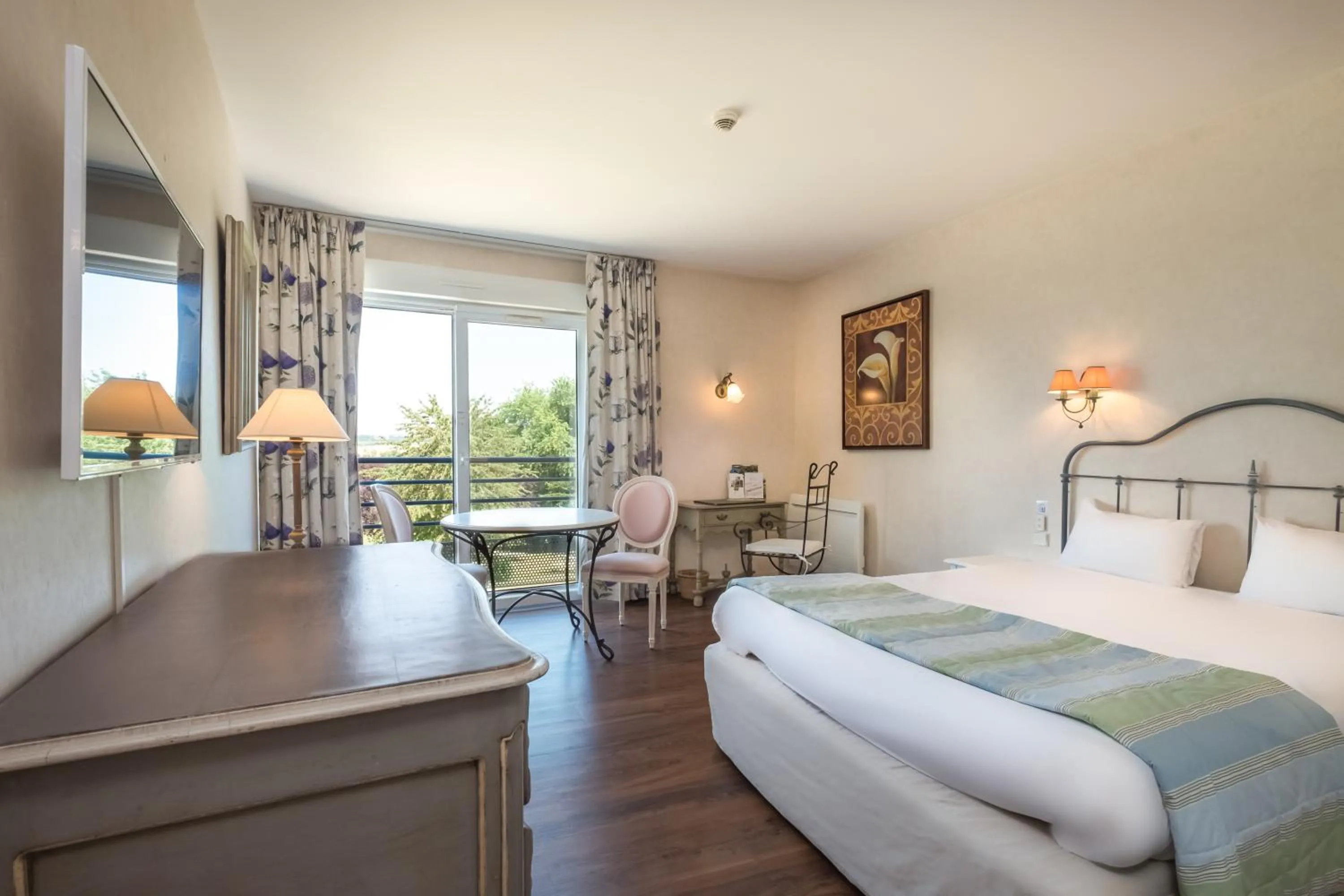 Photo of the whole room, Bed in Logis L'Ermitage Hôtel & Restaurant