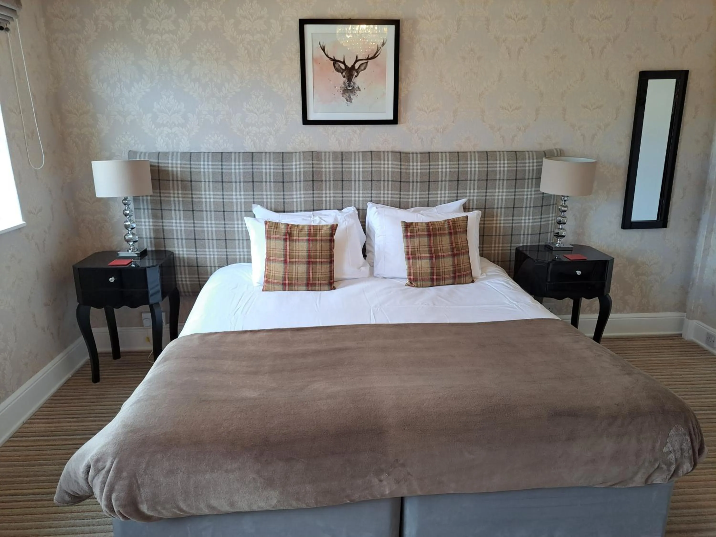 Bed in The Ambassador Townhouse