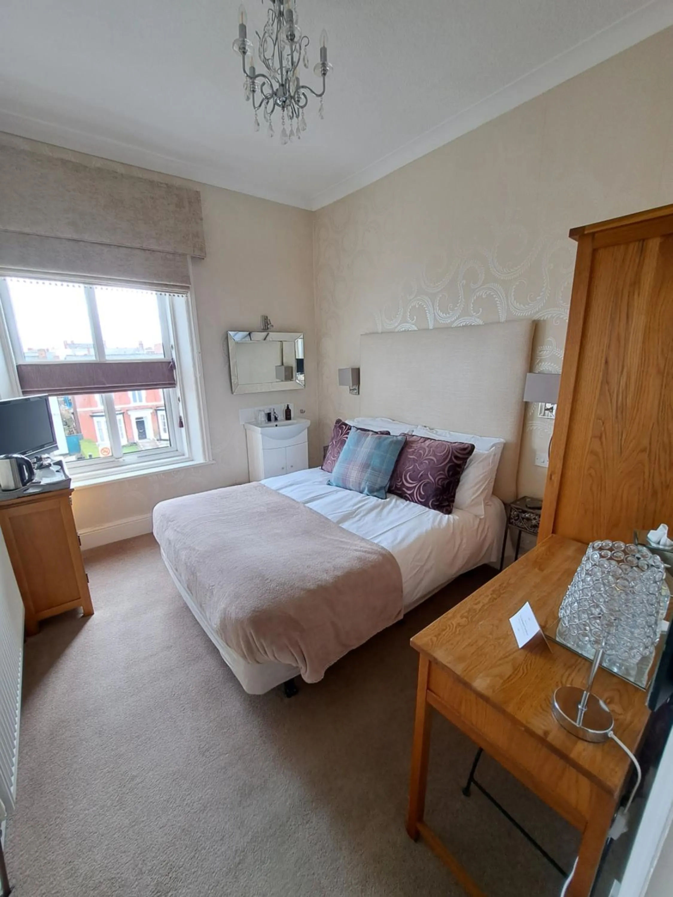 Bed in The Ambassador Townhouse