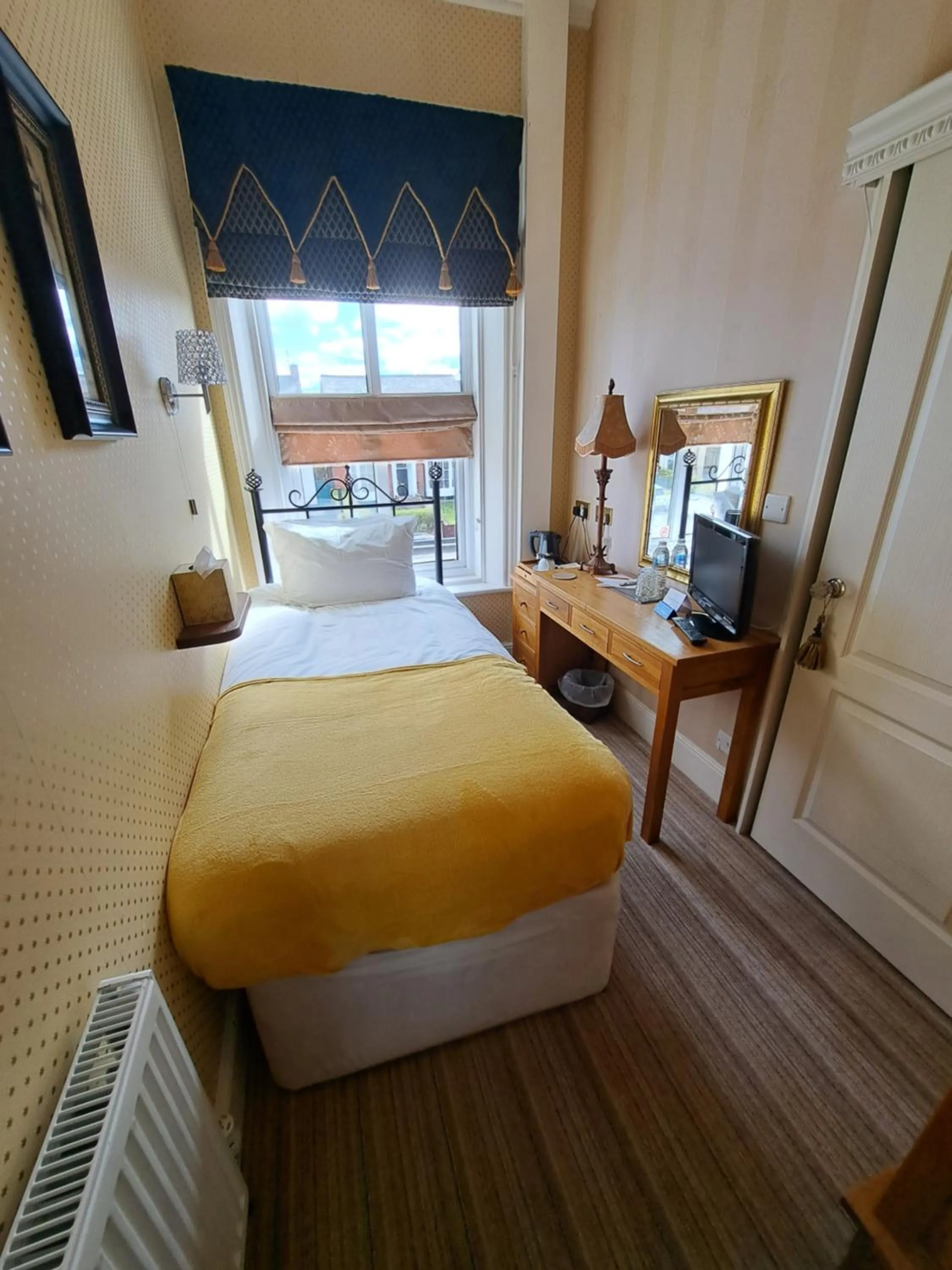 Bed in The Ambassador Townhouse