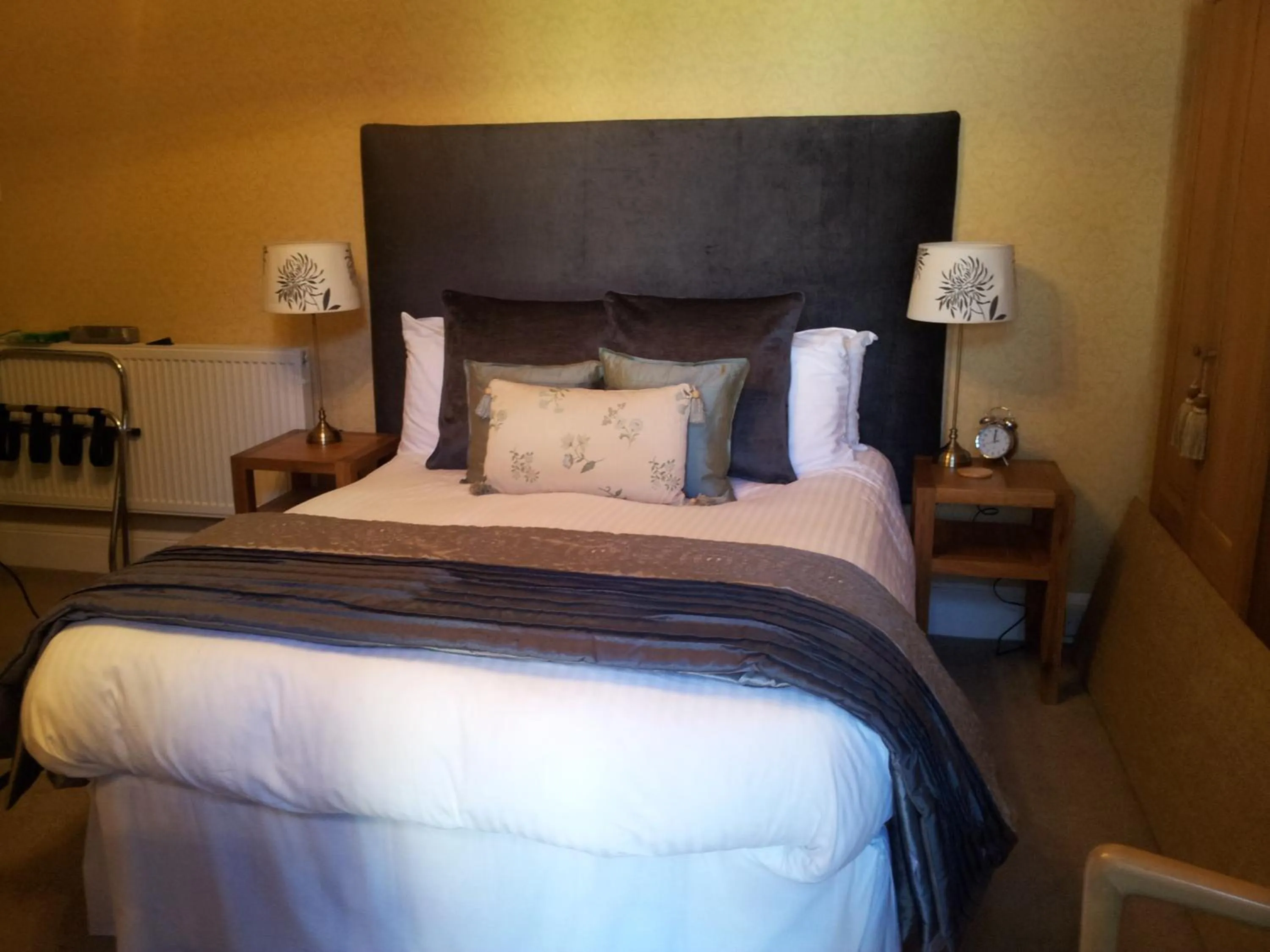 Bed in The Ambassador Townhouse