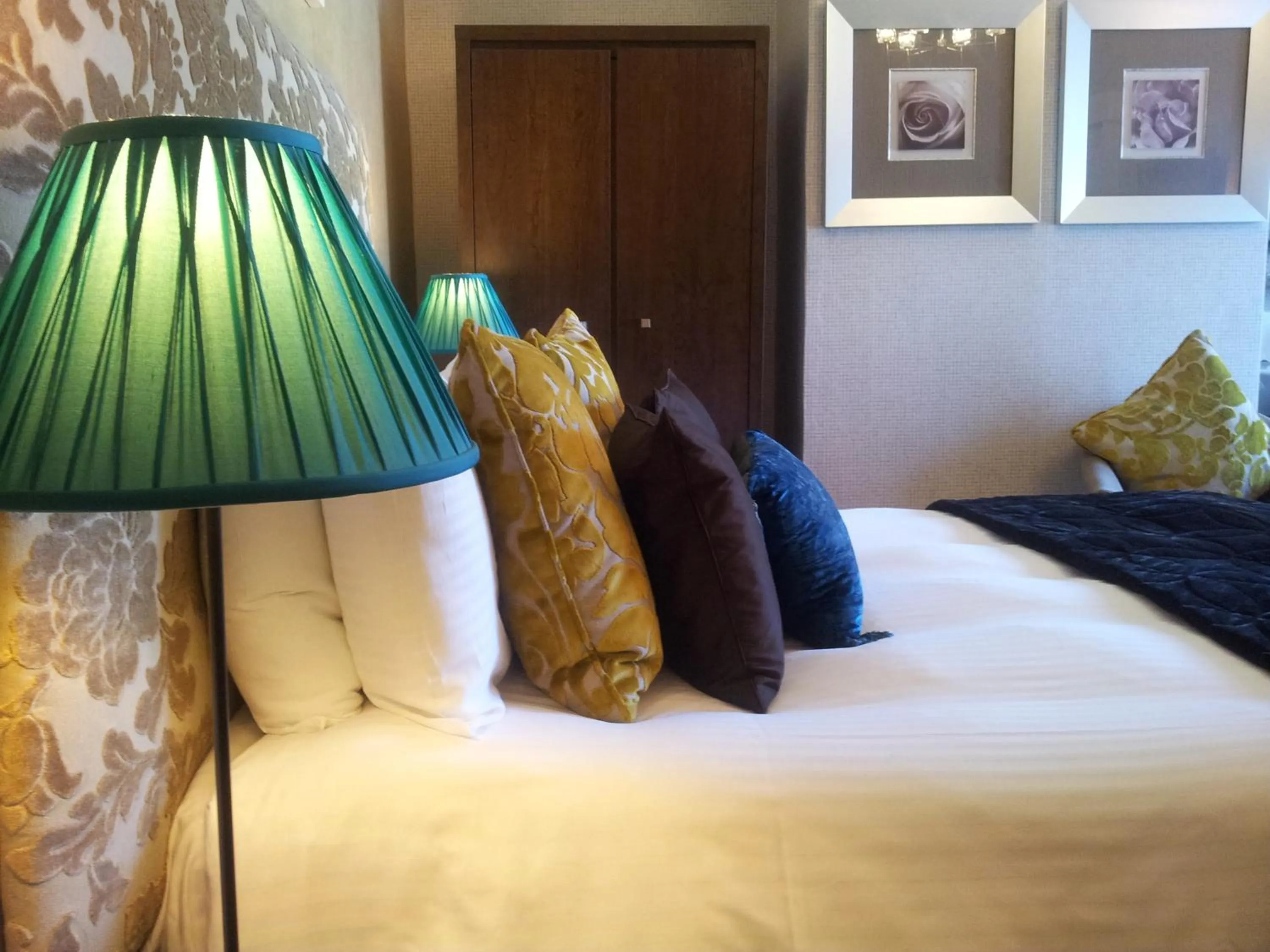 Bed in The Ambassador Townhouse