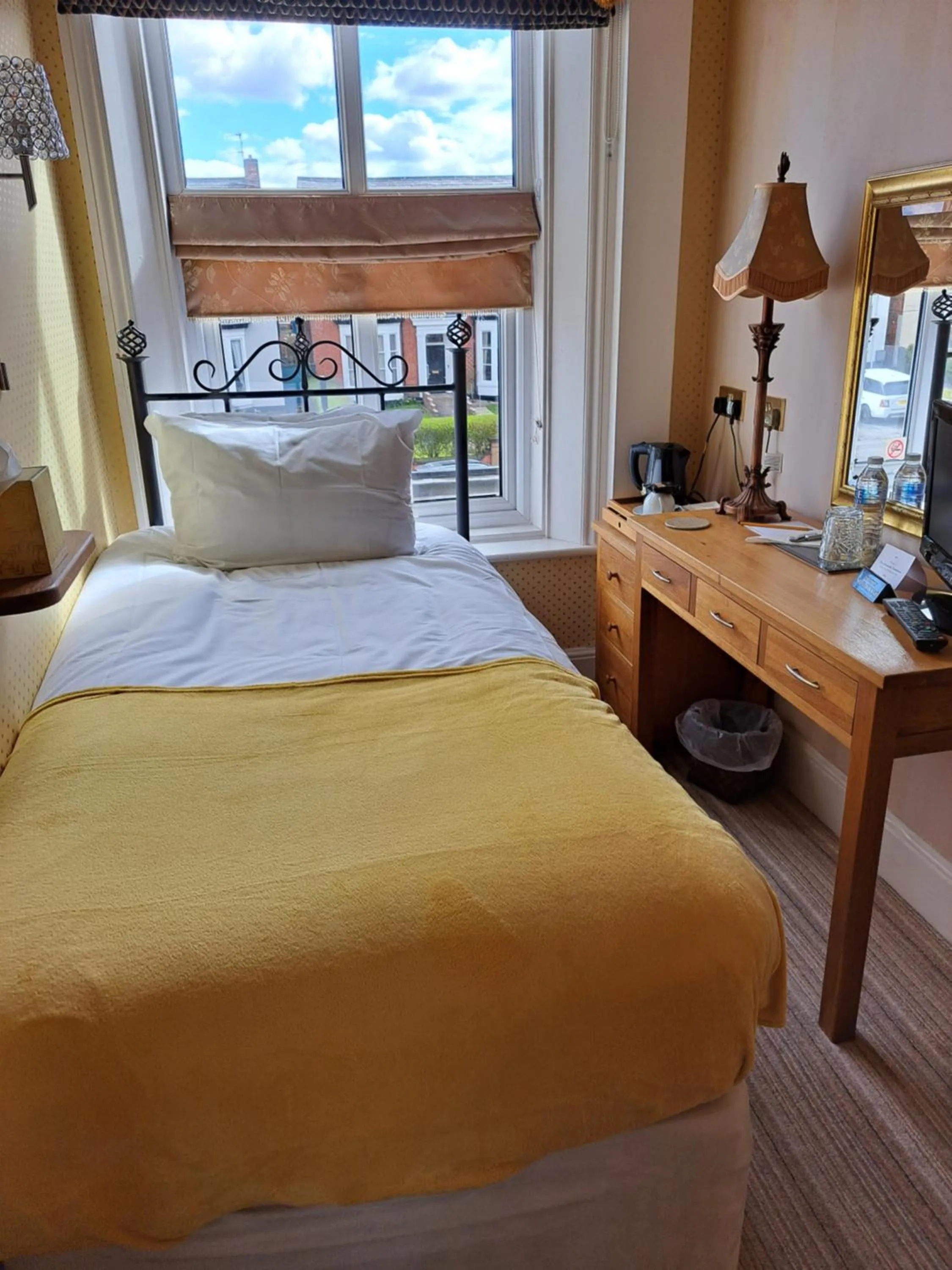 Bed in The Ambassador Townhouse