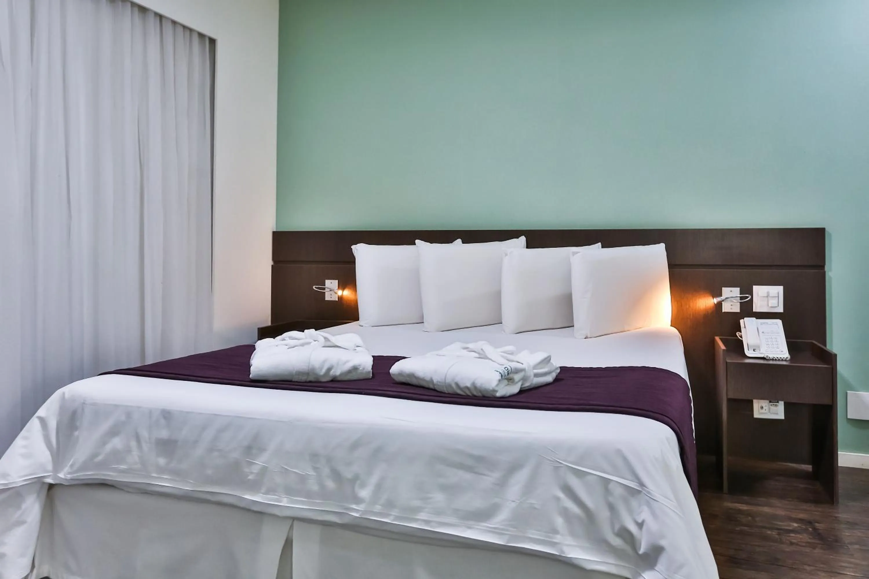 Bed in San Diego Suites Pampulha Hotel - Oficial