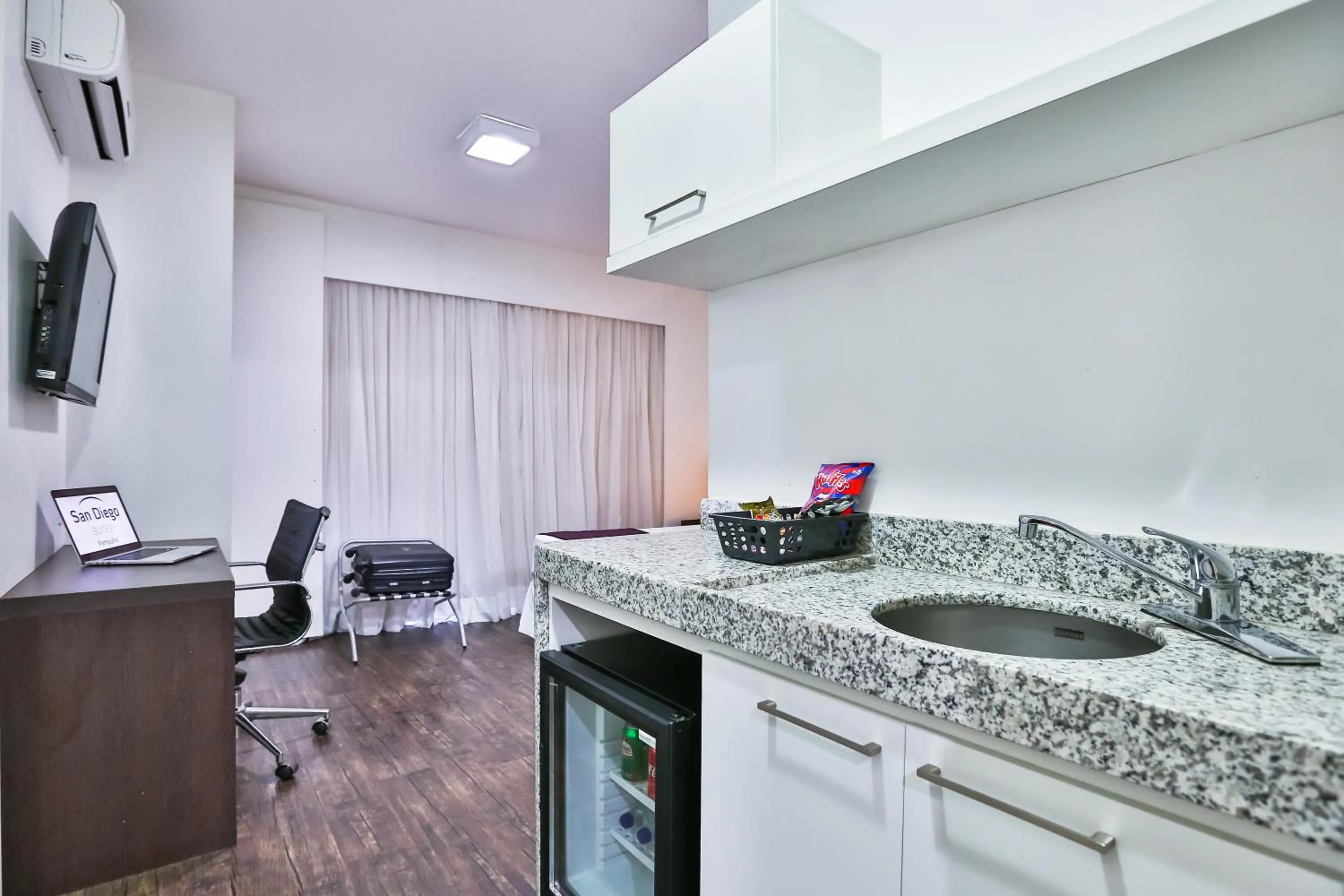 Kitchen or kitchenette in San Diego Suites Pampulha Hotel - Oficial