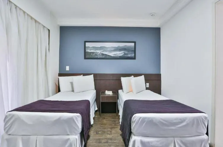 Bed in San Diego Suites Pampulha Hotel - Oficial