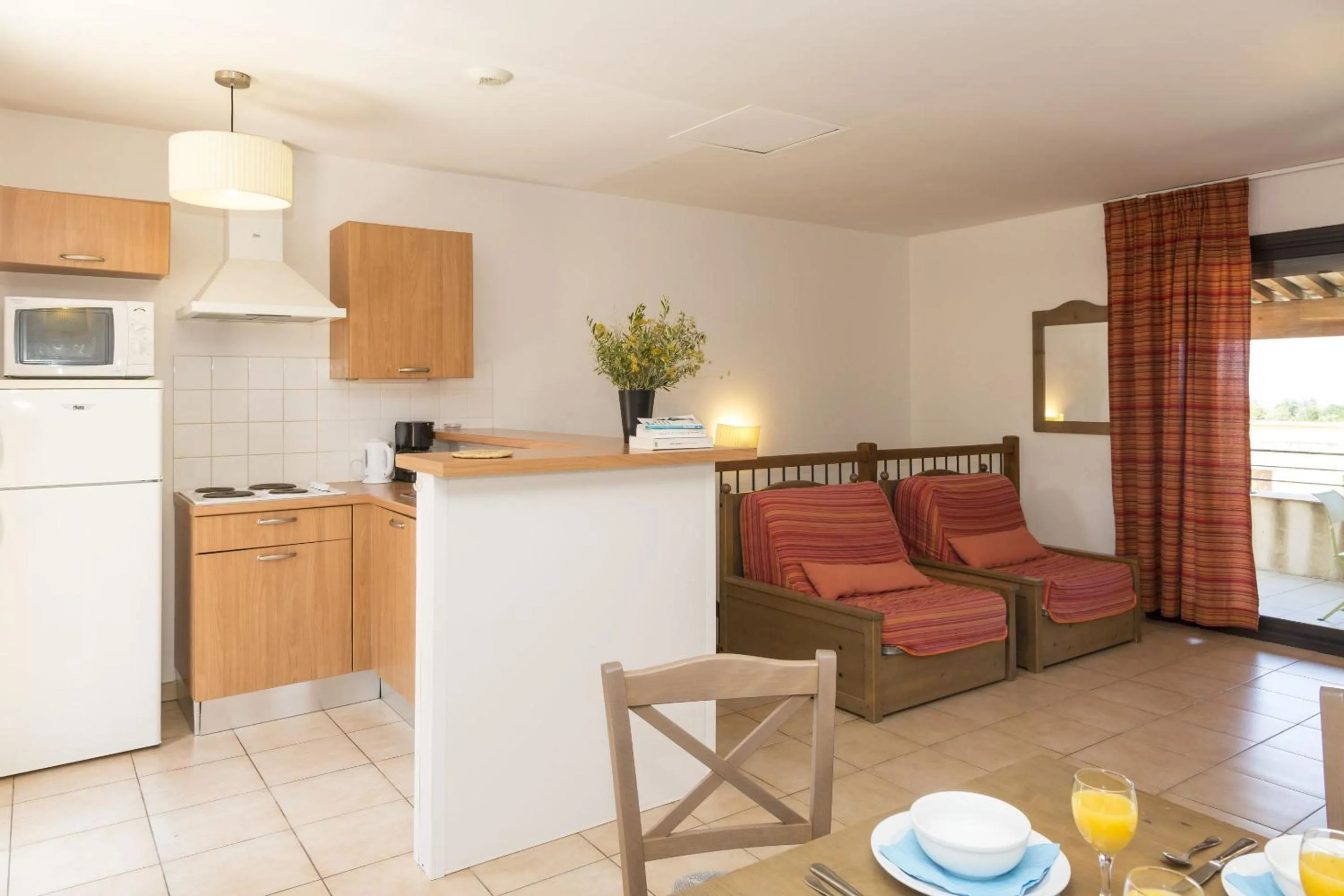 Seating area in Résidence Odalys Les Hameaux de Capra Scorsa