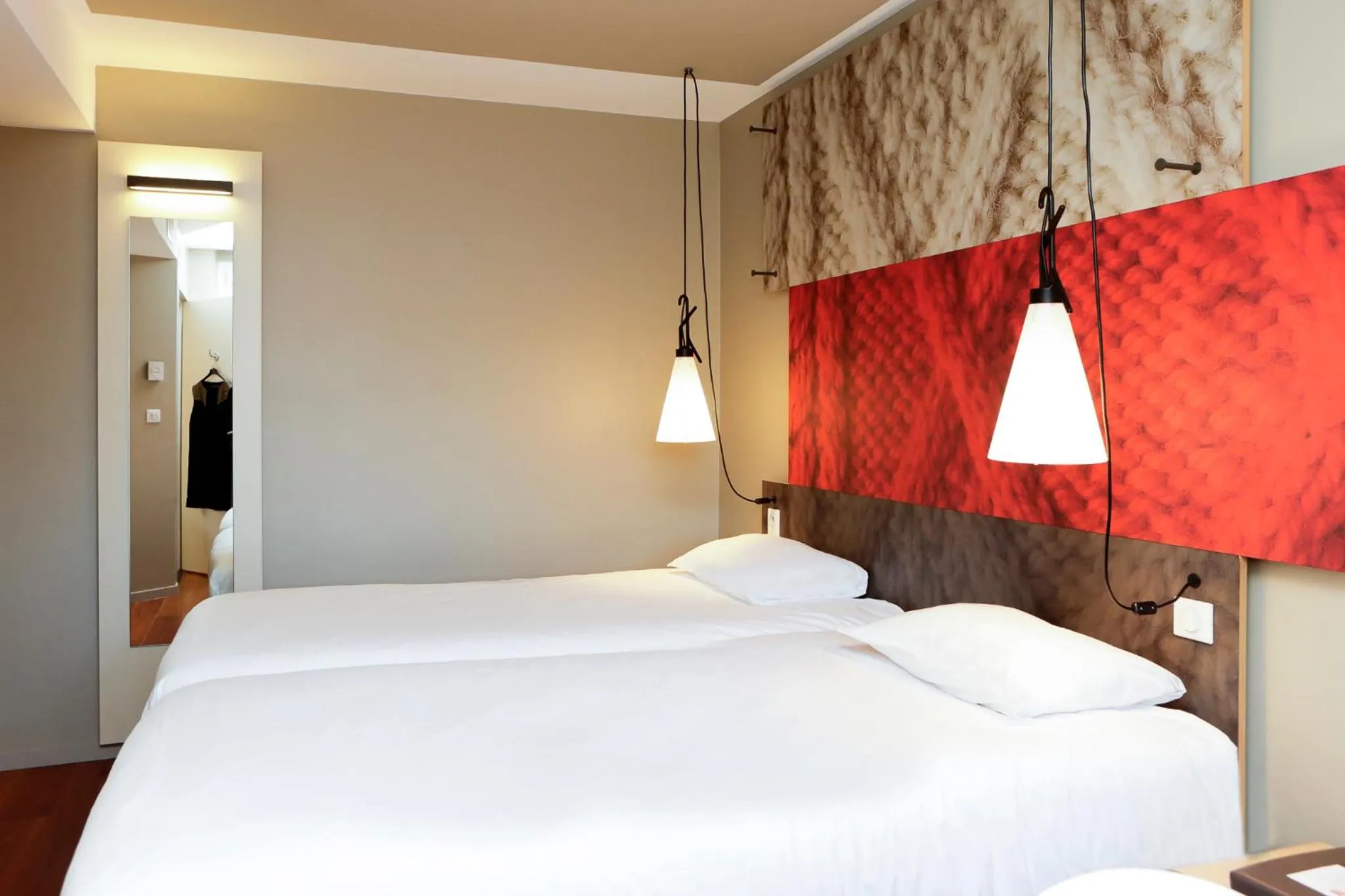 Decorative detail, Bed in ibis Besançon Centre Ville