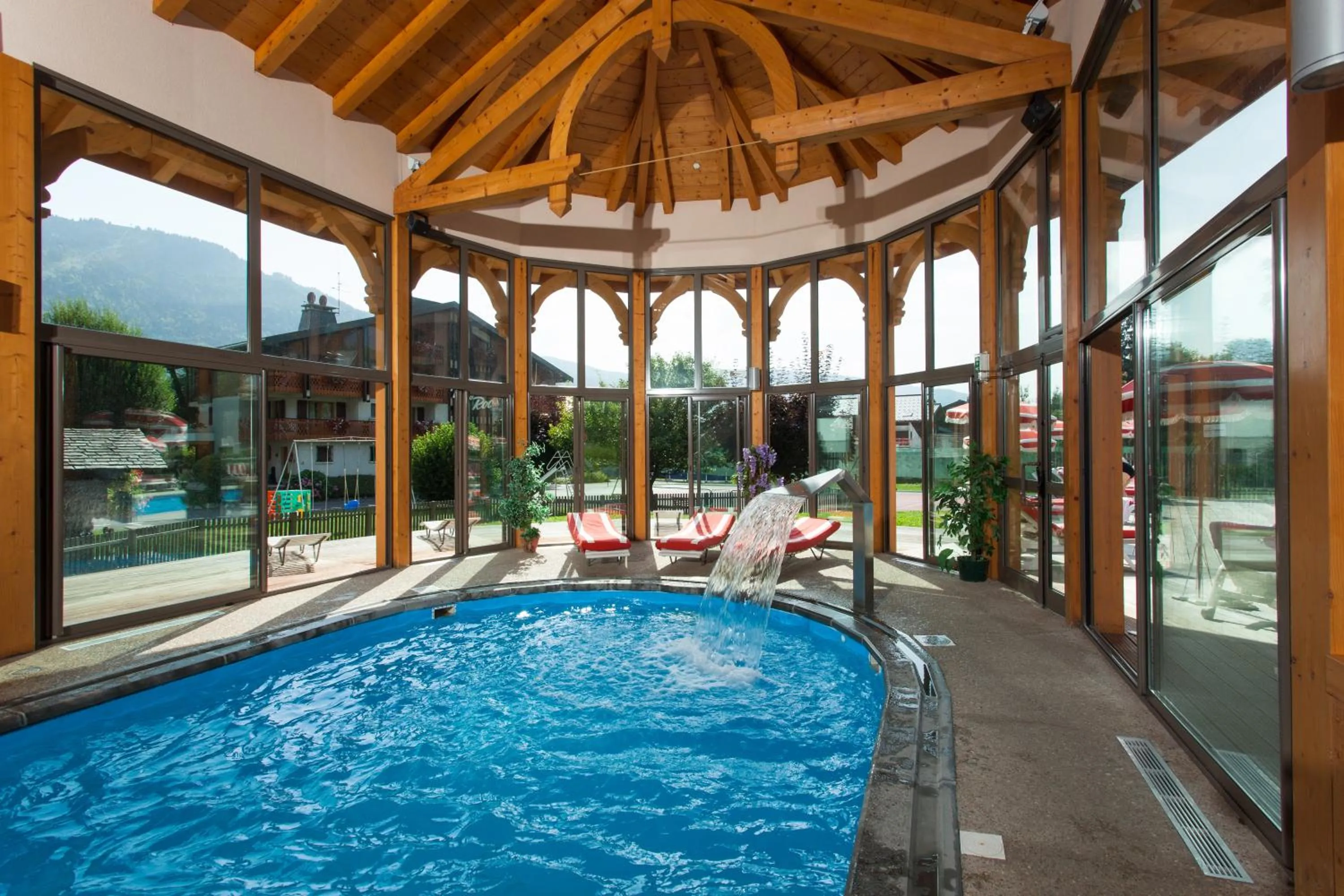 Swimming pool in Chalet-Hôtel Neige et Roc, The Originals Relais