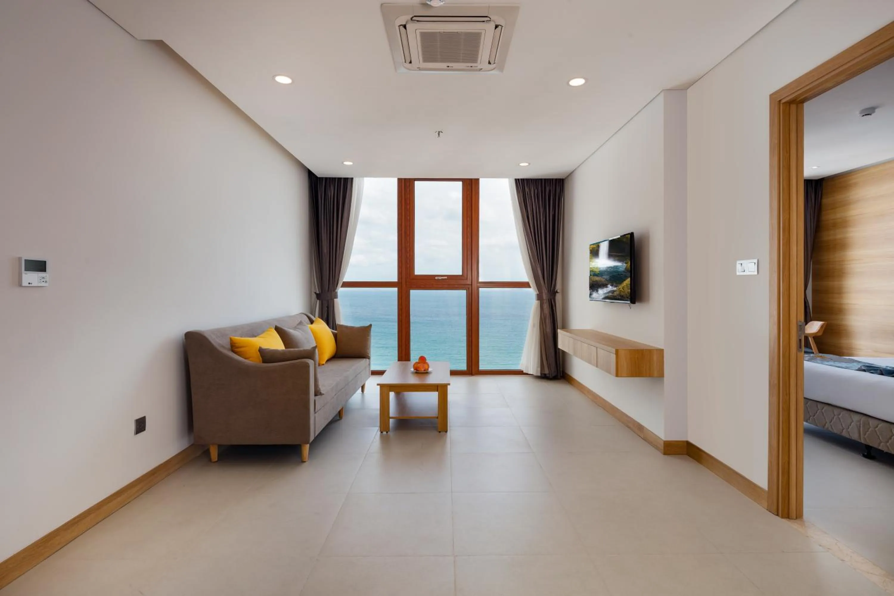 Living room, Bed in Sun Kiss Hotel