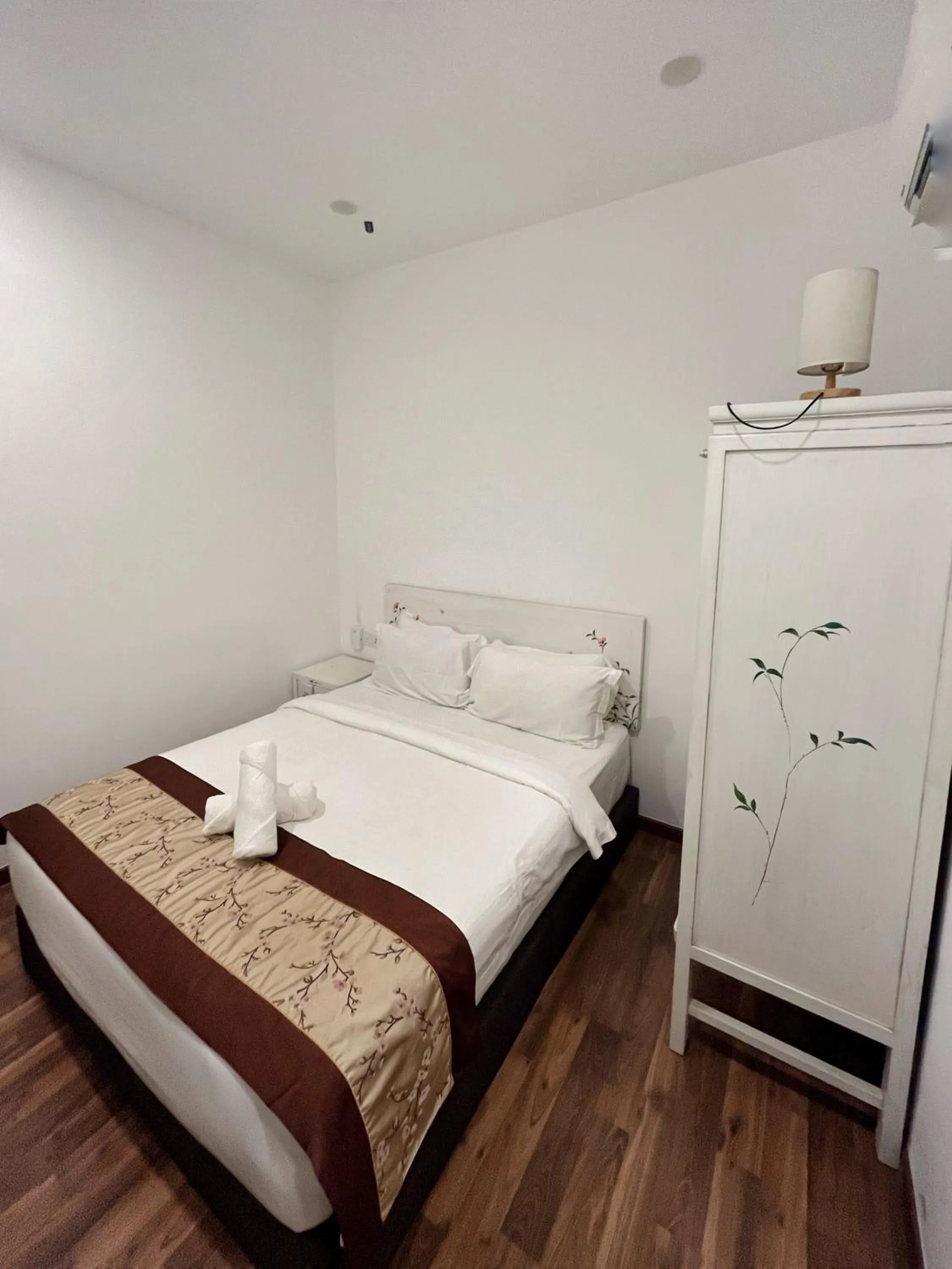 Bed in Mclane Boutique Hotel