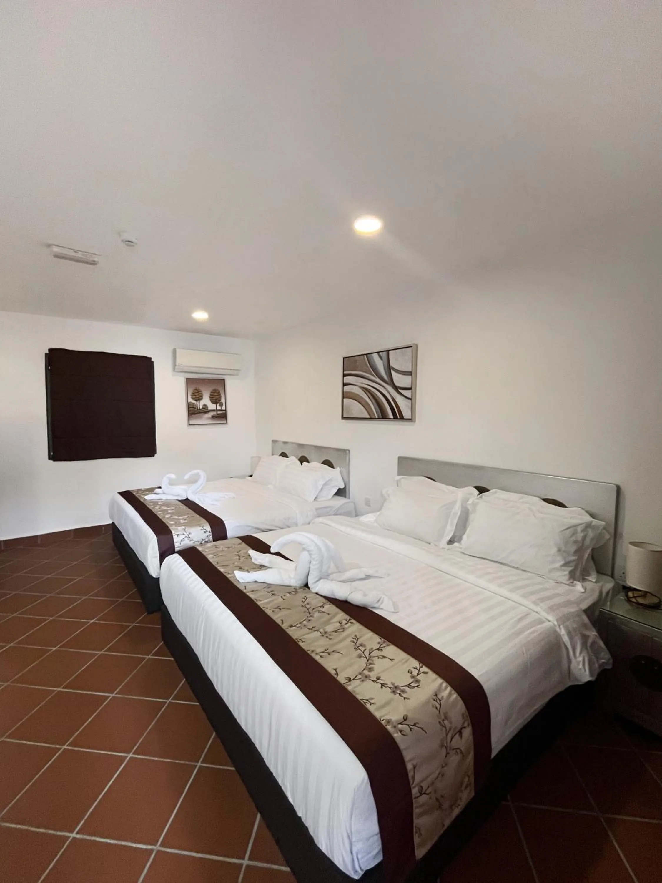 Bed in Mclane Boutique Hotel