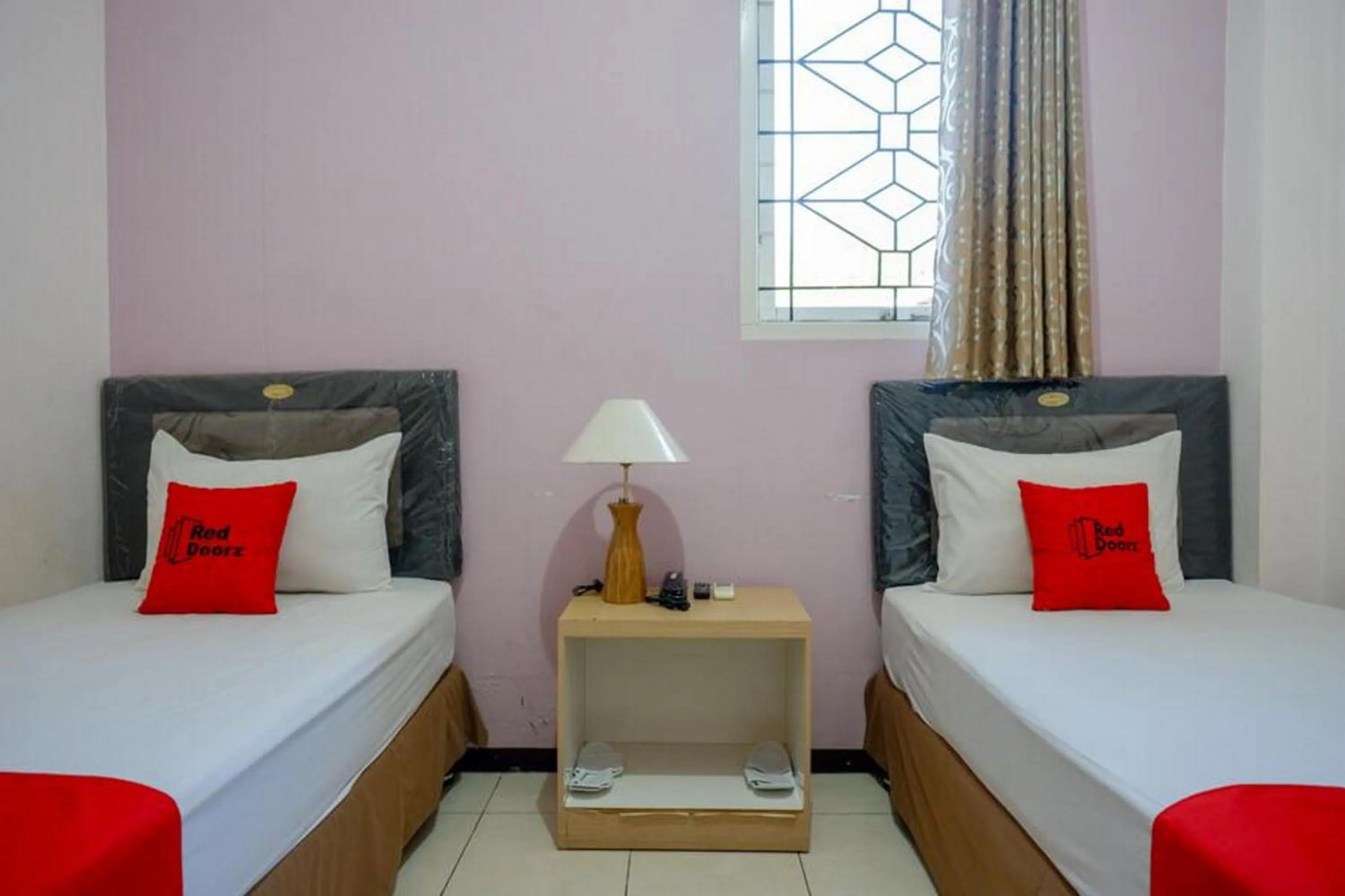 Bedroom in RedDoorz Plus Syariah @ Hotel Boulevard Luwuk