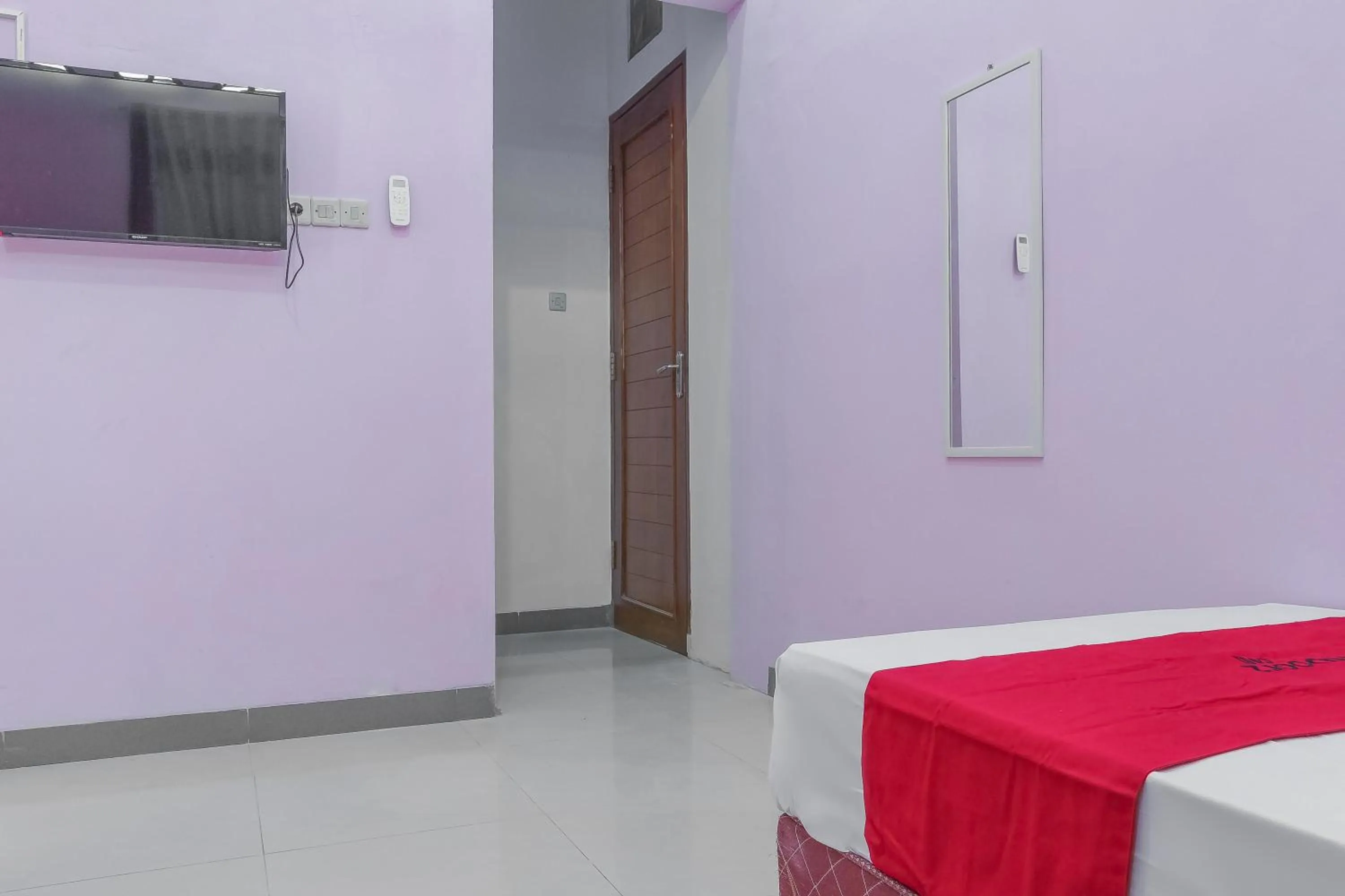 Bed in RedDoorz Syariah @ Puri Kalijaga Street