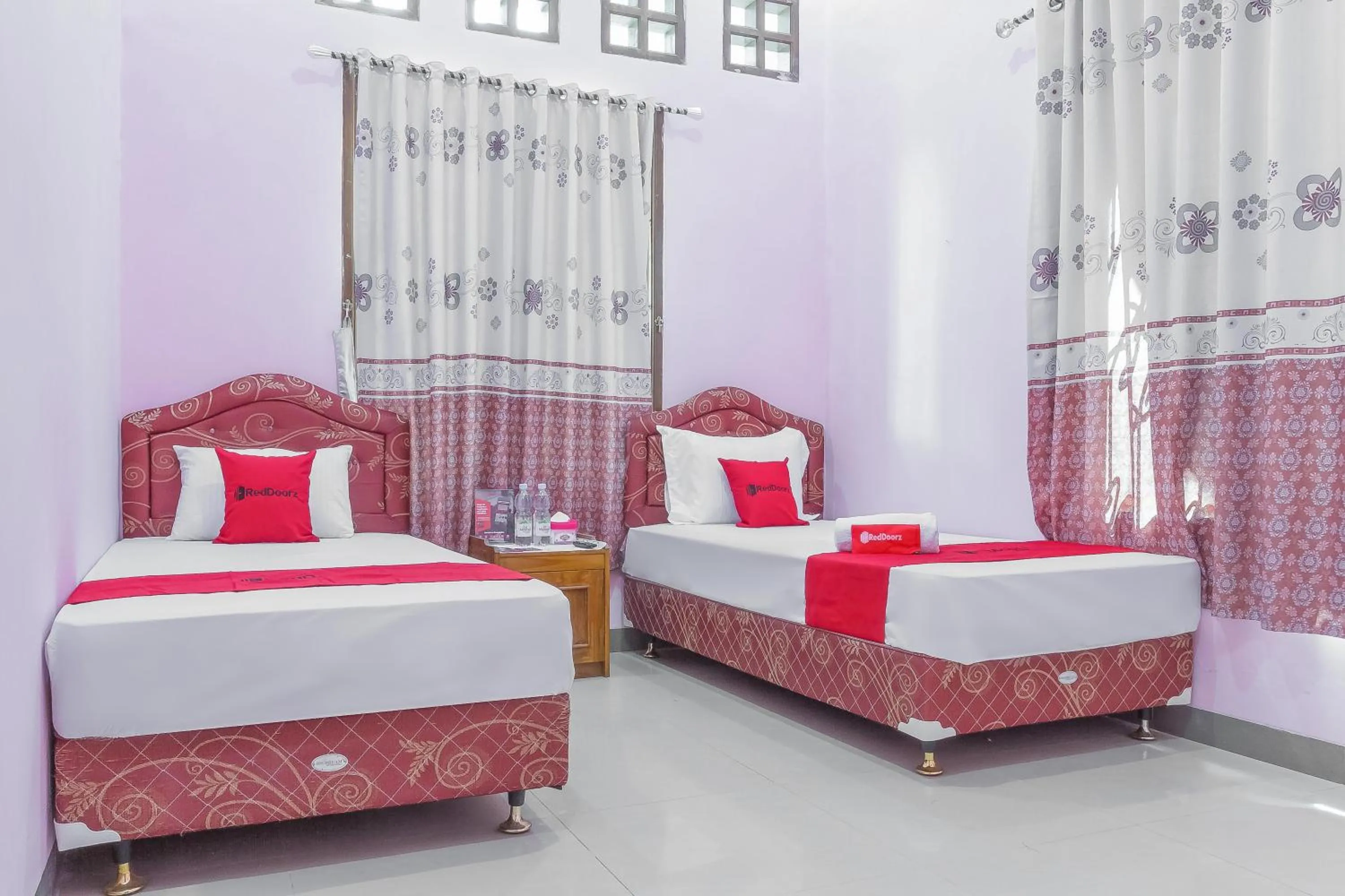 Bed in RedDoorz Syariah @ Puri Kalijaga Street