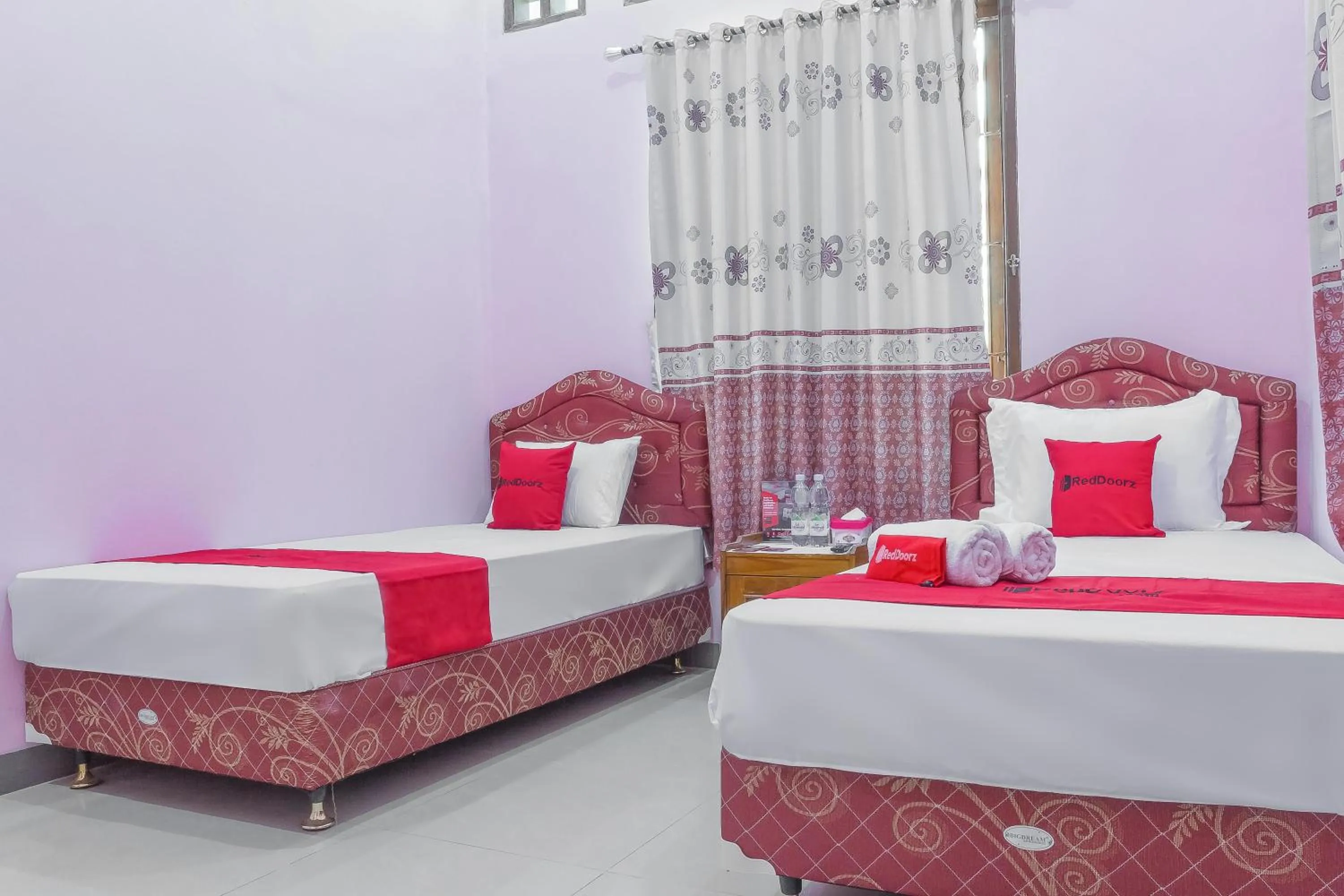 Bed in RedDoorz Syariah @ Puri Kalijaga Street